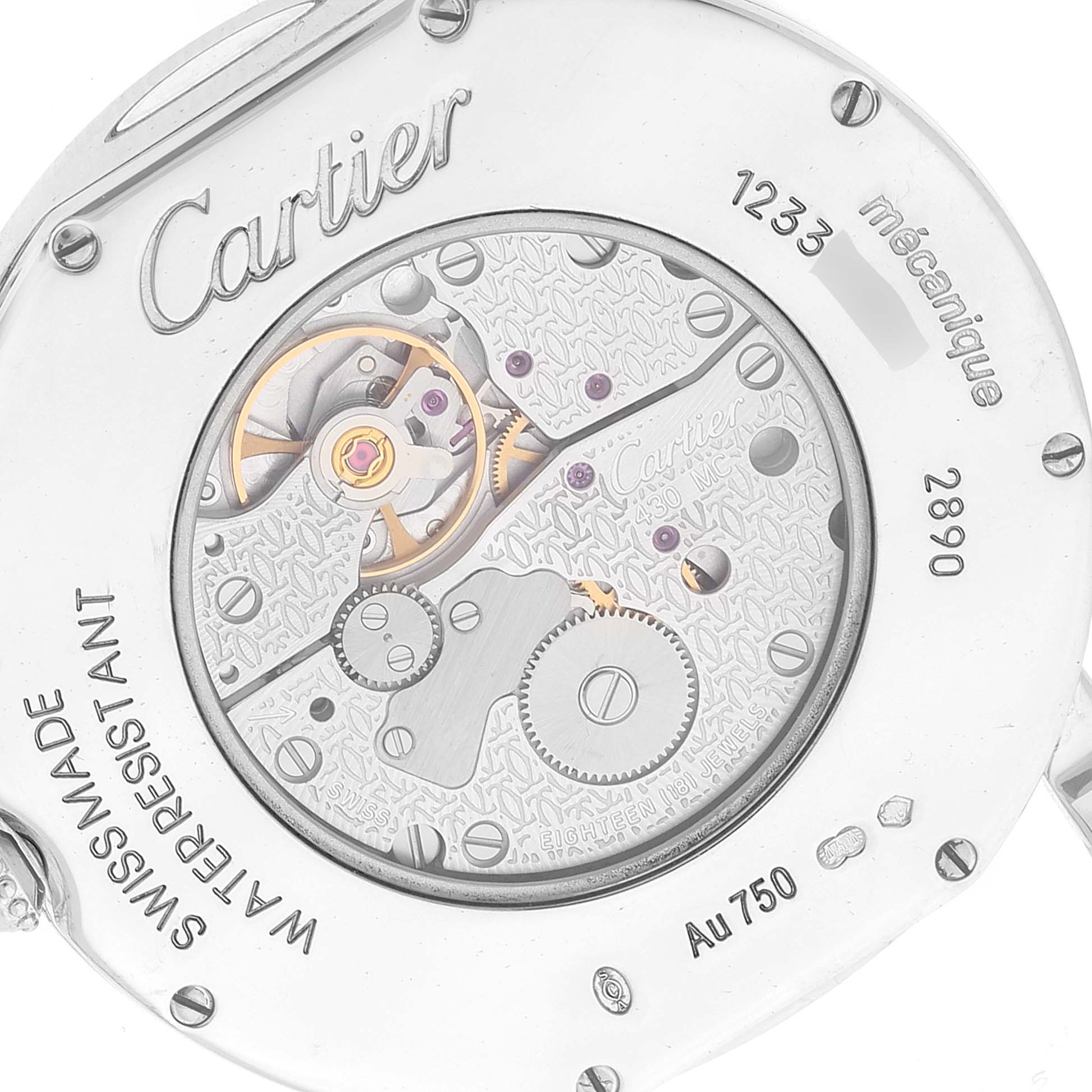 The image shows the intricate mechanical movement and back casing of a Cartier Ronde WR000551 Women's White Gold Silver Dial WR000551 Women's White Gold Silver Dial watch.