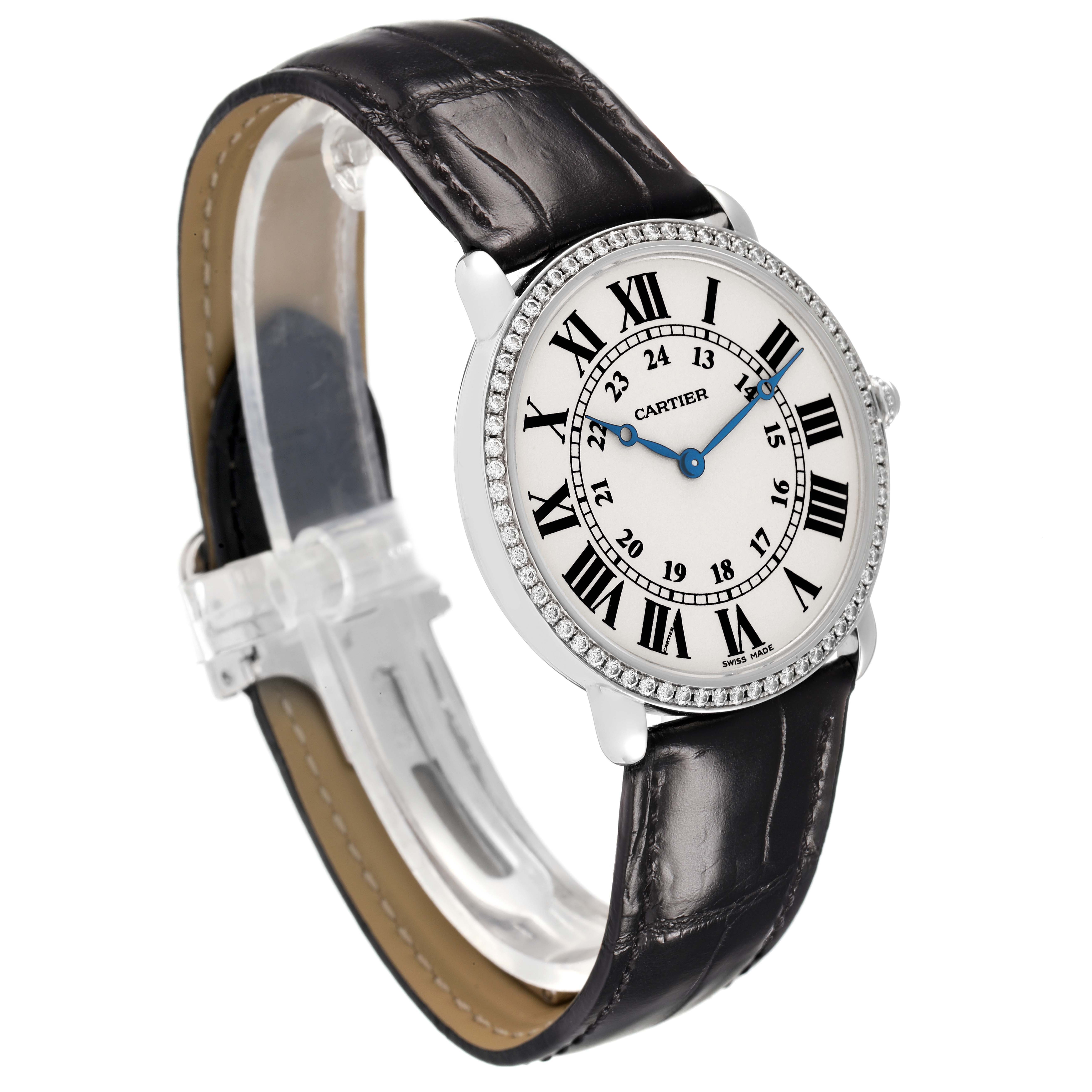 The Cartier Ronde WR000551 Women's White Gold Silver Dial watch is shown at a three-quarter angle, highlighting the face, bezel, and leather strap.