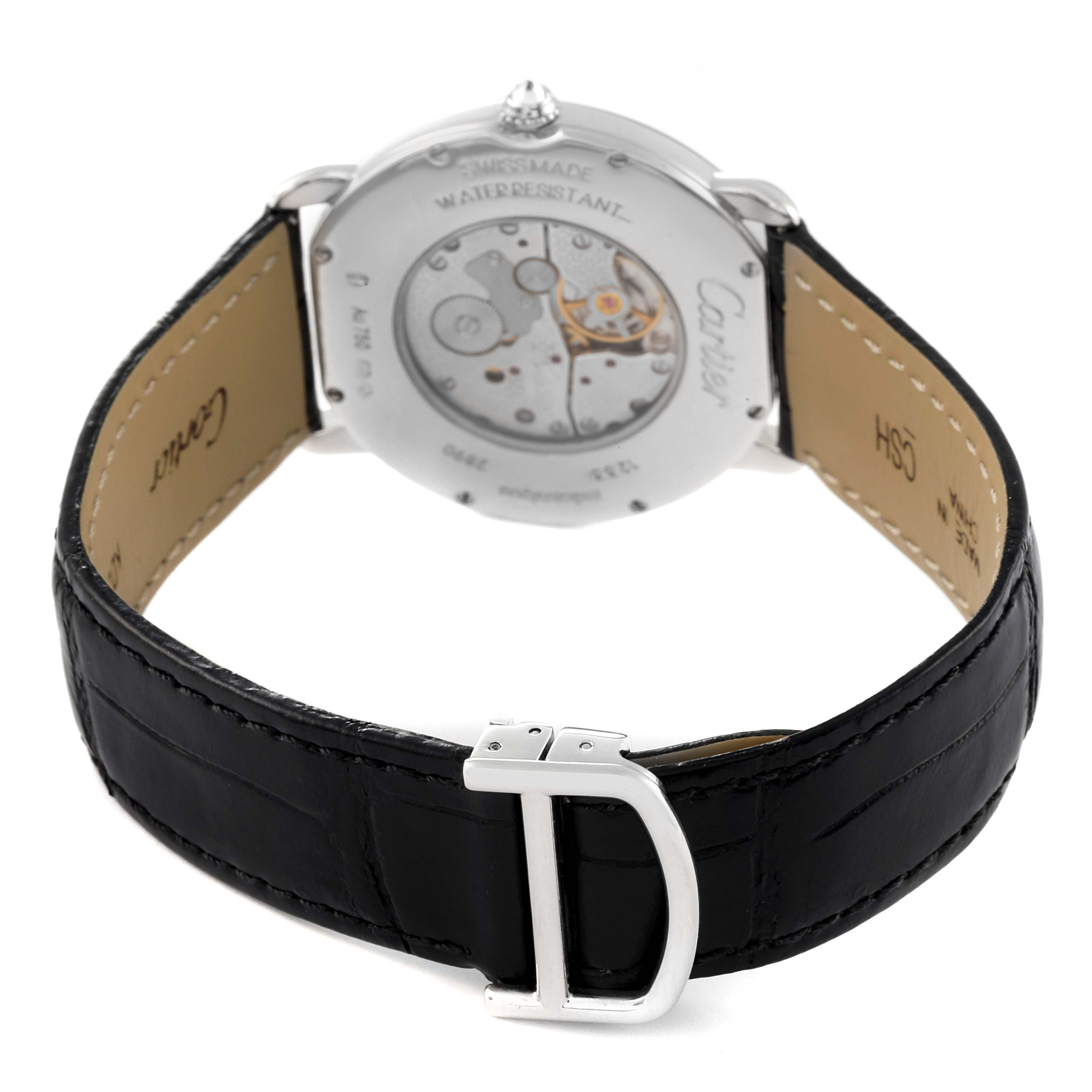 The image shows the back of the Cartier Ronde WR000551 Women's White Gold Silver Dial watch, focusing on the movement and black leather strap with a metal buckle.