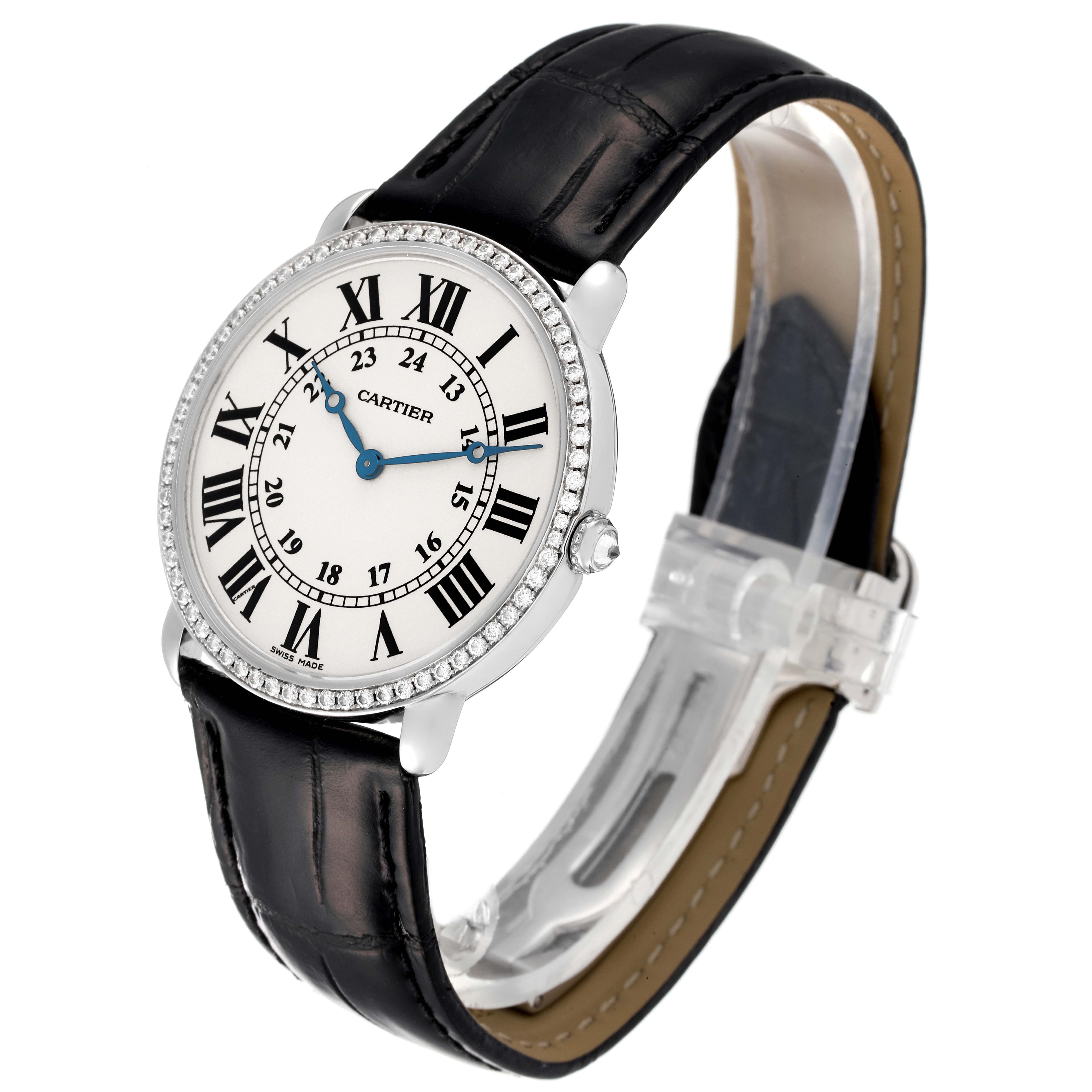 The Cartier Ronde WR000551 Women's White Gold Silver Dial WR000551 Women's White Gold Silver Dial watch is shown at a slight angle, displaying the face, bezel, and black leather strap.