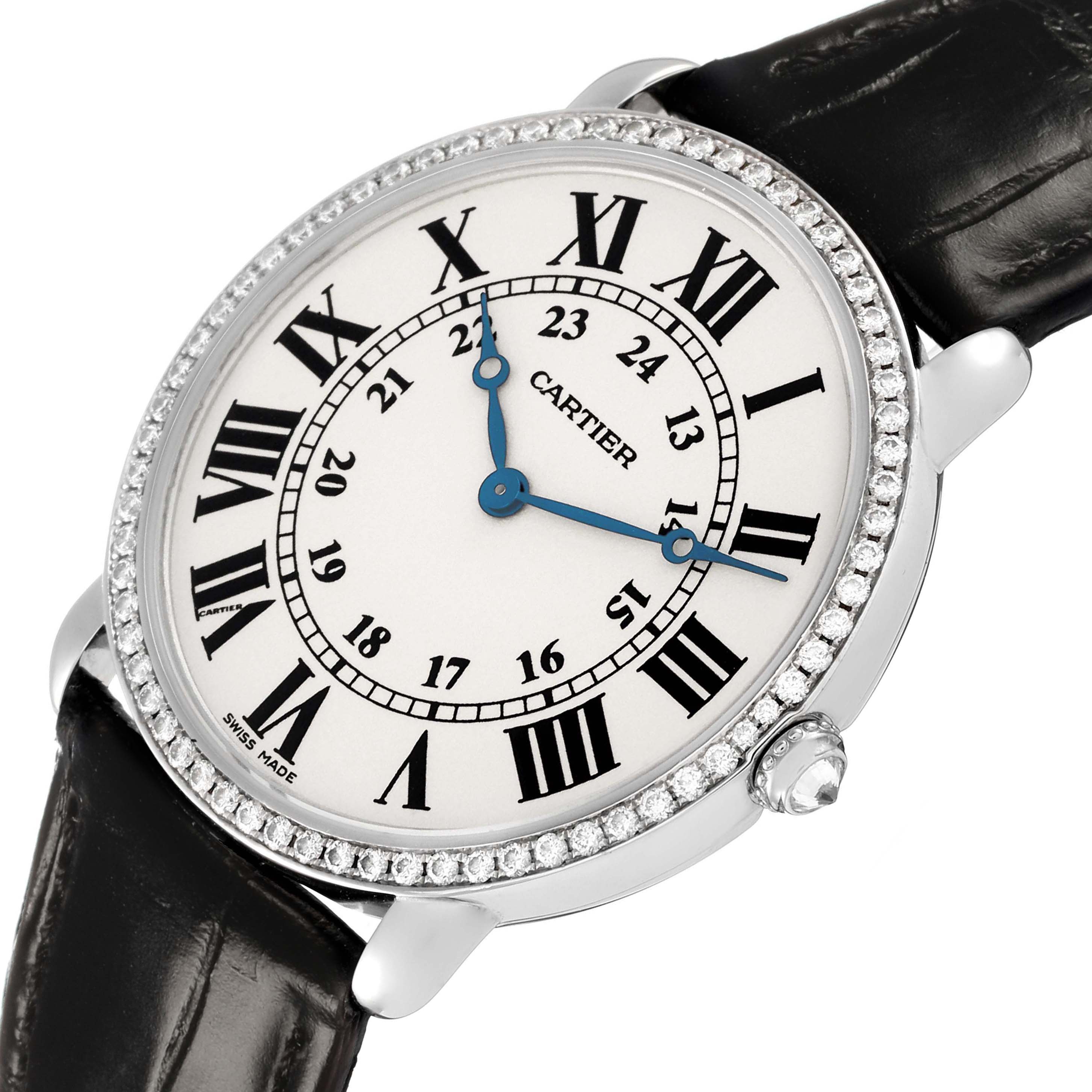 The Cartier Ronde WR000551 Women's White Gold Silver Dial model watch is shown at a slight angle, displaying its face, bezel, and strap.