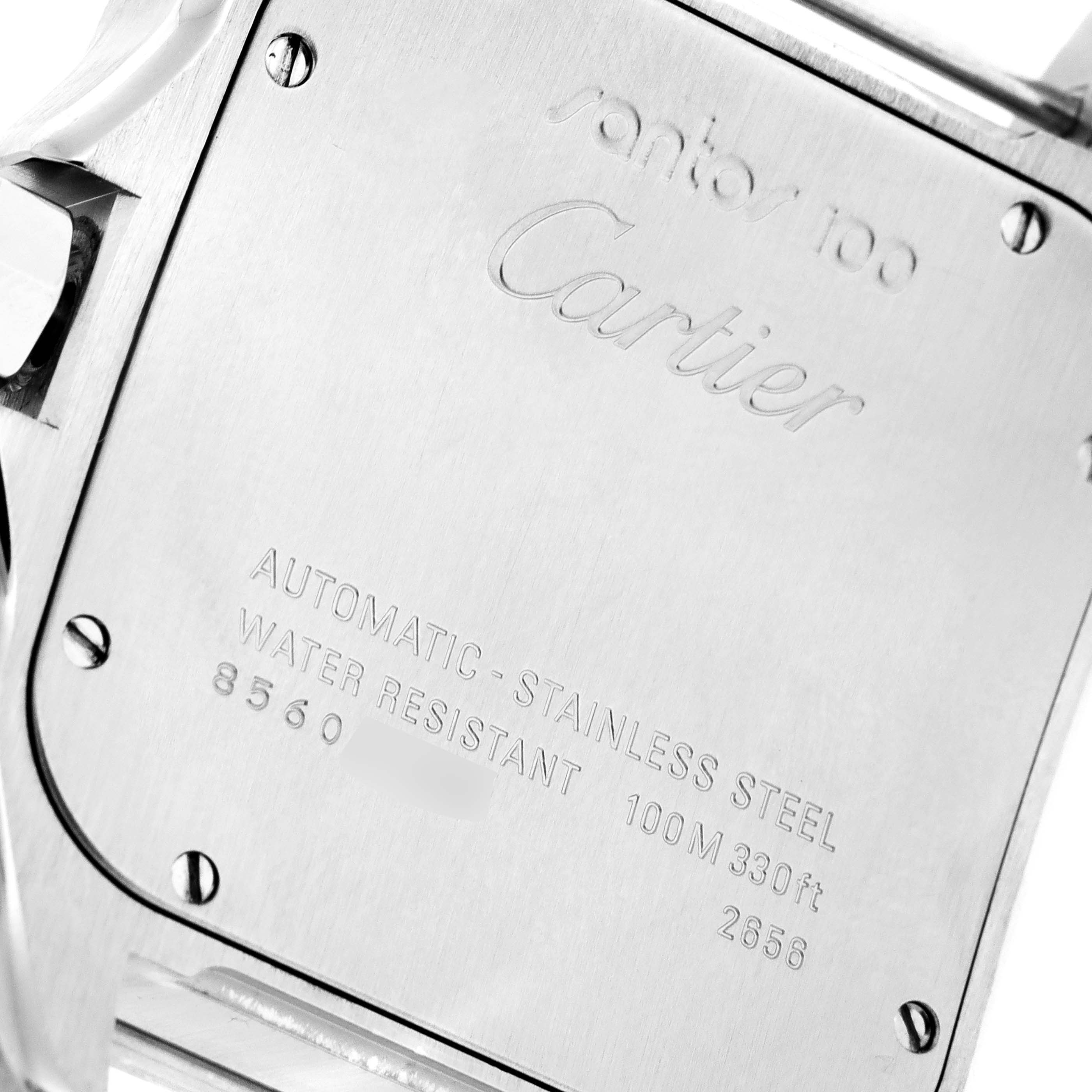 The image shows the back case of a Cartier Santos W20073X8 Men's Stainless Steel Silver Dial W20073X8 Men's Stainless Steel Silver Dial watch, displaying specifications and brand engravings.