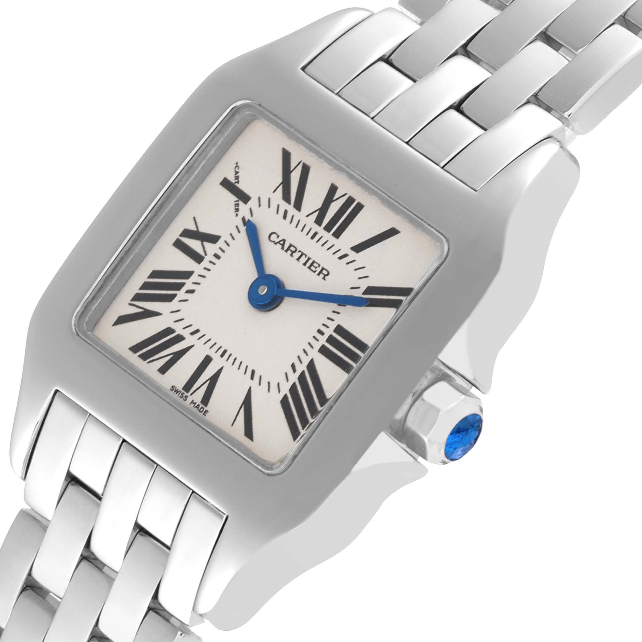 This image shows a close-up view of the Cartier Santos Demoiselle W25064Z5 Women
s Stainless Steel Silver Dial W25064Z5 Women
s Stainless Steel Silver Dial watch face, bracelet, and crown, angled slightly from the 10 o
clock position.