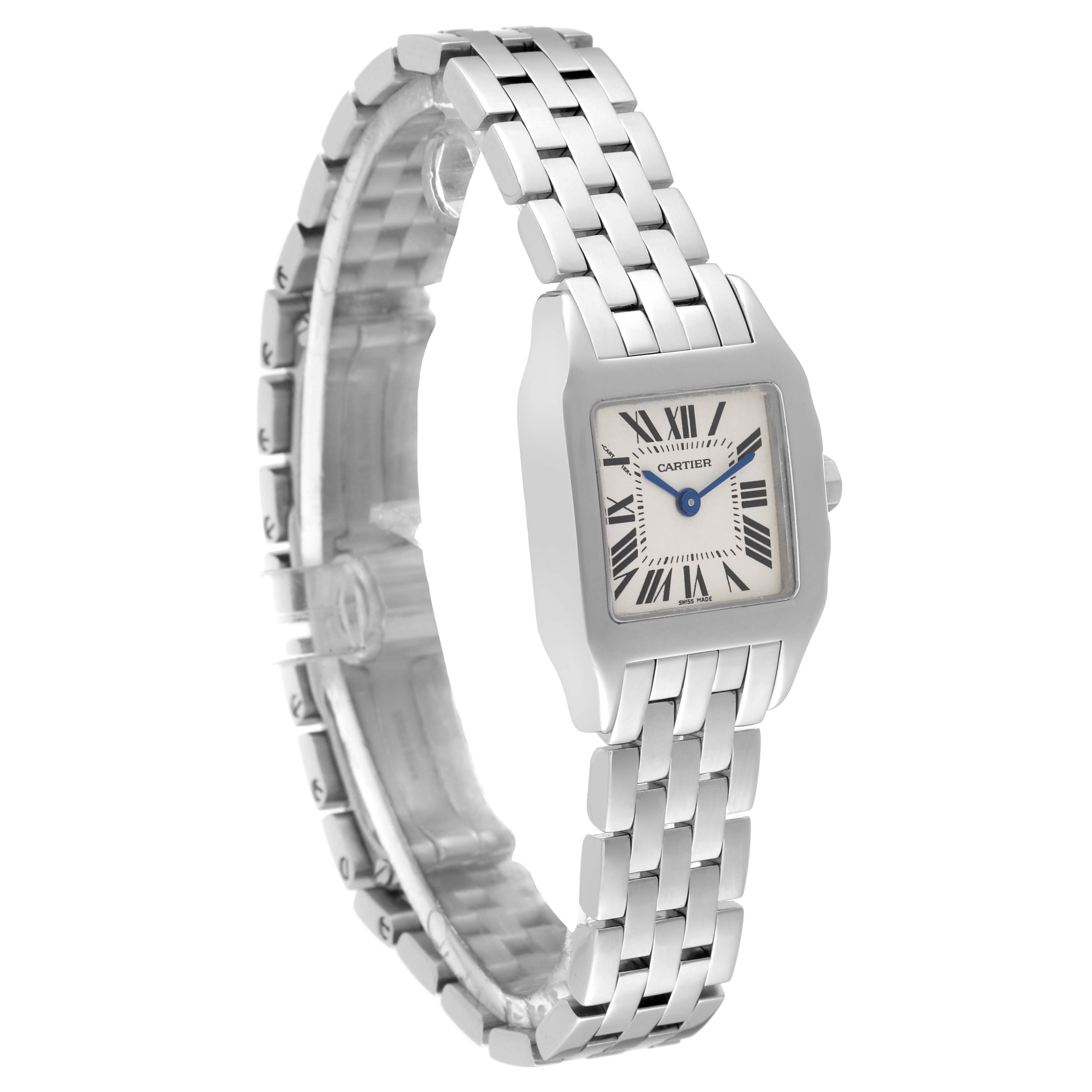 The image shows a side angle view of the Cartier Santos Demoiselle W25064Z5 Women
s Stainless Steel Silver Dial W25064Z5 Women
s Stainless Steel Silver Dial watch, highlighting the bezel, bracelet, and face.