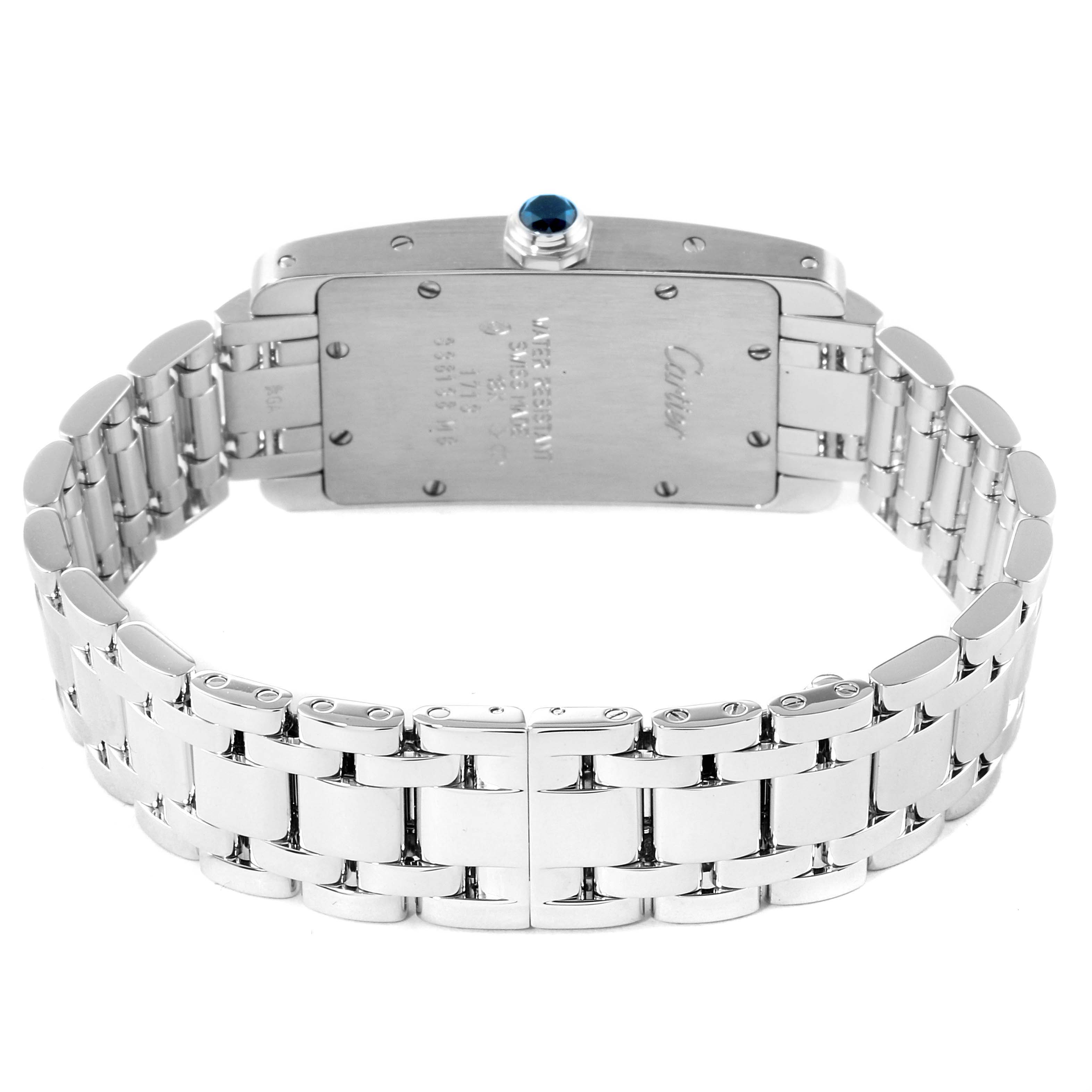 The image shows the back case and bracelet of a Cartier Tank Americaine W008067 Women's White Gold Silver Dial W008067 Women's White Gold Silver Dial watch, highlighting its links and clasp.