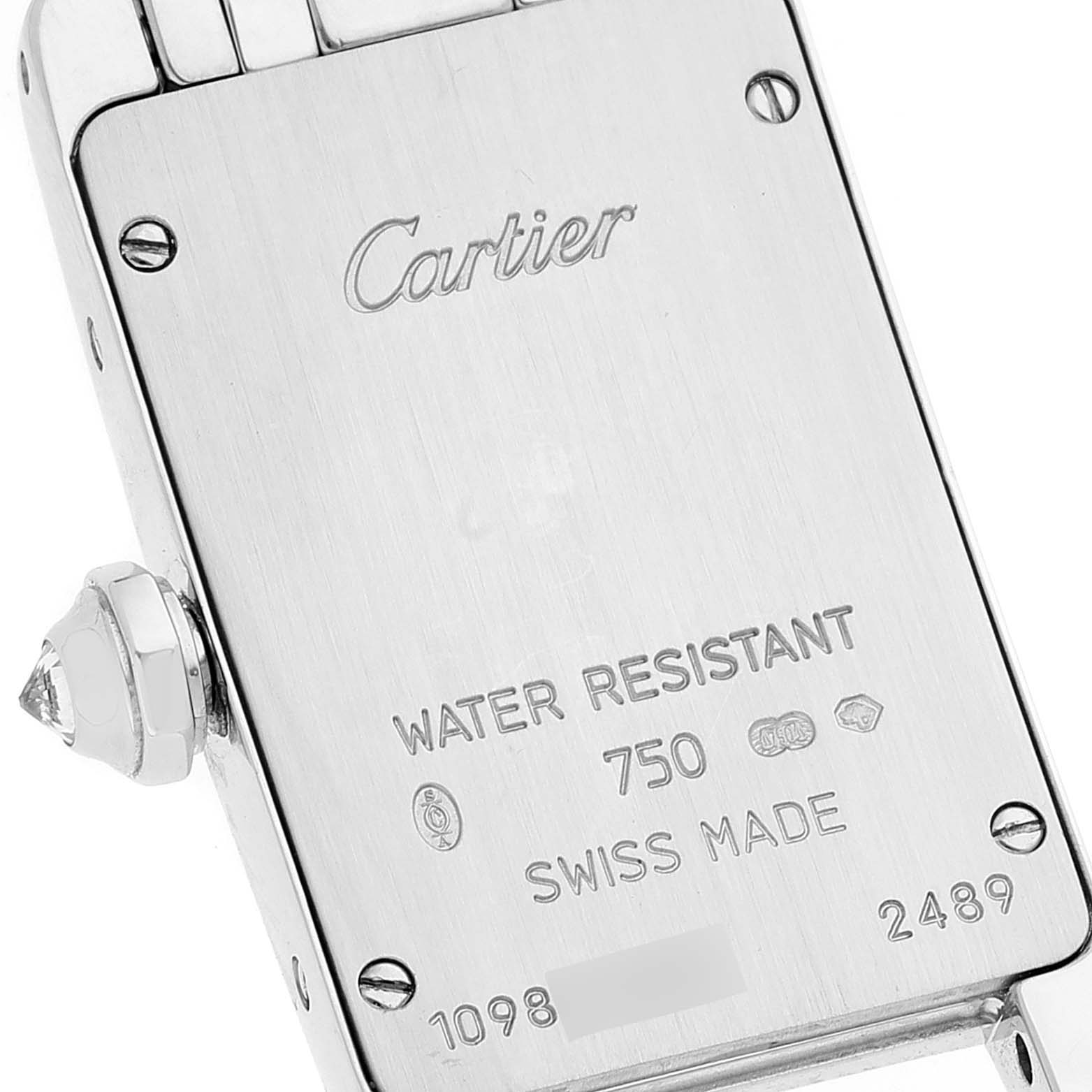 This image shows the back case of a Cartier Tank Americaine WB7018L1 Women
s White Gold Silver Dial WB7018L1 Women
s White Gold Silver Dial watch, highlighting its engravings and crown.