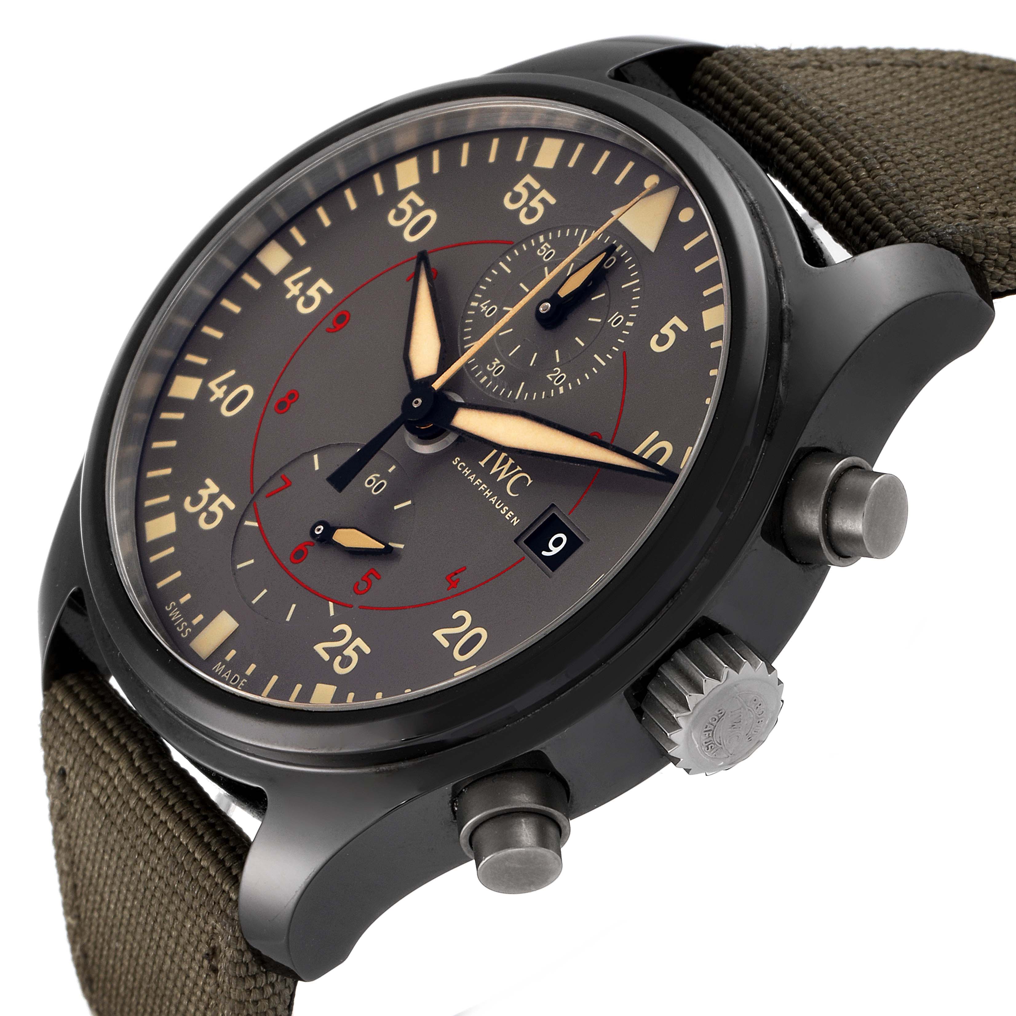 The image shows a close-up, angled view of the IWC Pilot IW389002 Men's Ceramic Black Dial IW389002 Men's Ceramic Black Dial model watch, highlighting the dial, crown, pushers, and strap.