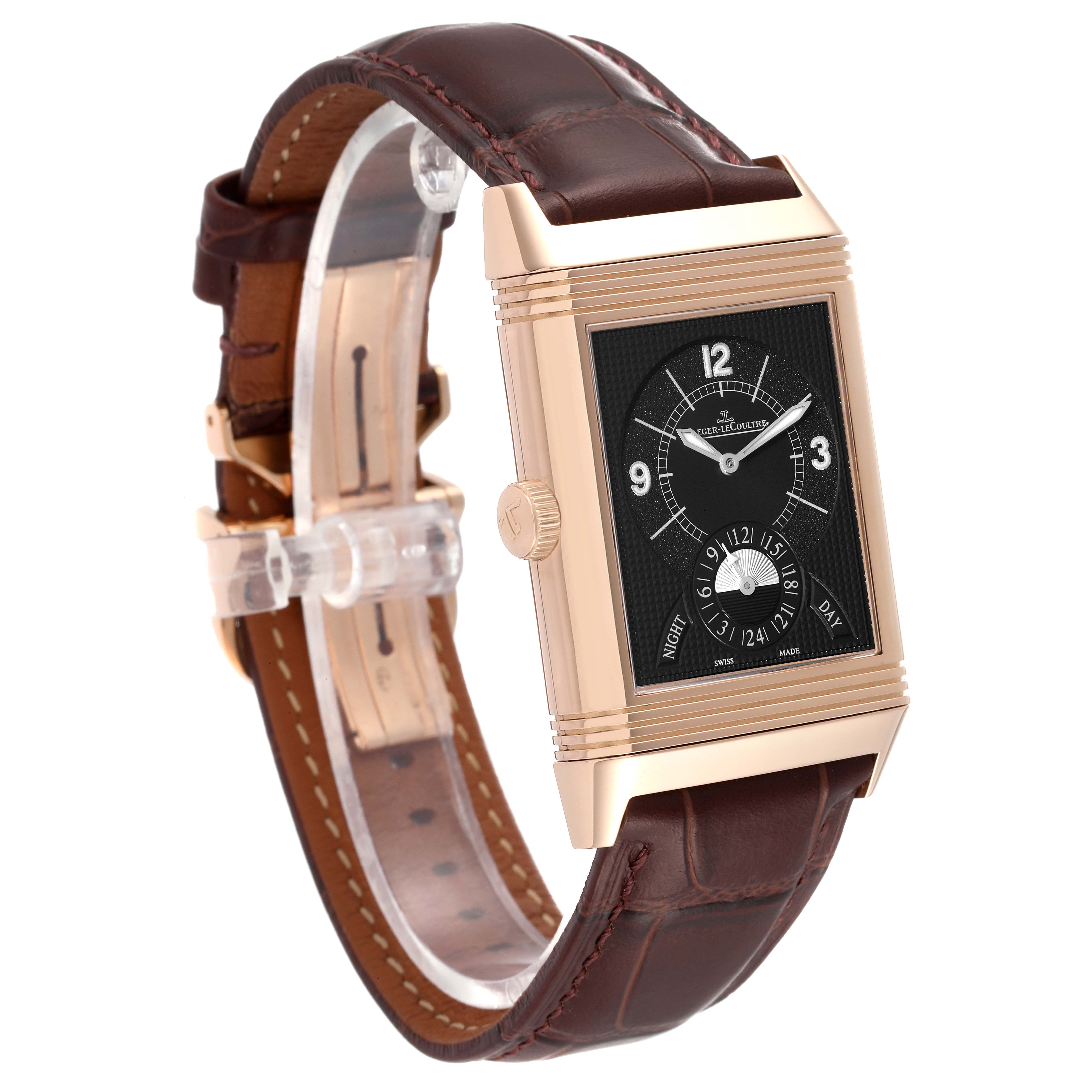 This image shows a front angled view of the Jaeger-LeCoultre Reverso watch with a rectangular case and leather strap.