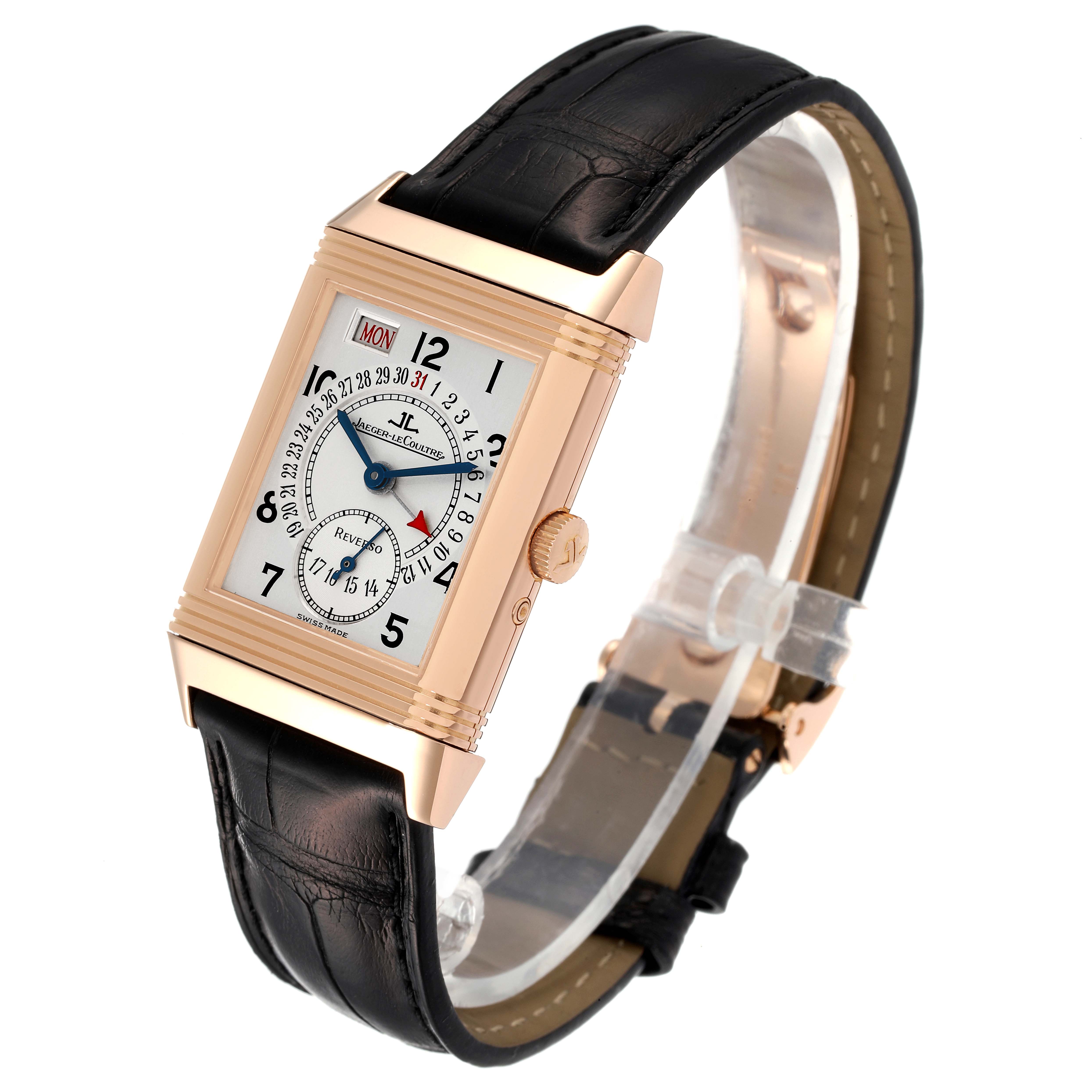 The Jaeger LeCoultre Reverso Q273242A Men's Rose Gold Silver Dial Q273242A Men's Rose Gold Silver Dial watch is shown at a slight angle, displaying its face, crown, and leather strap.