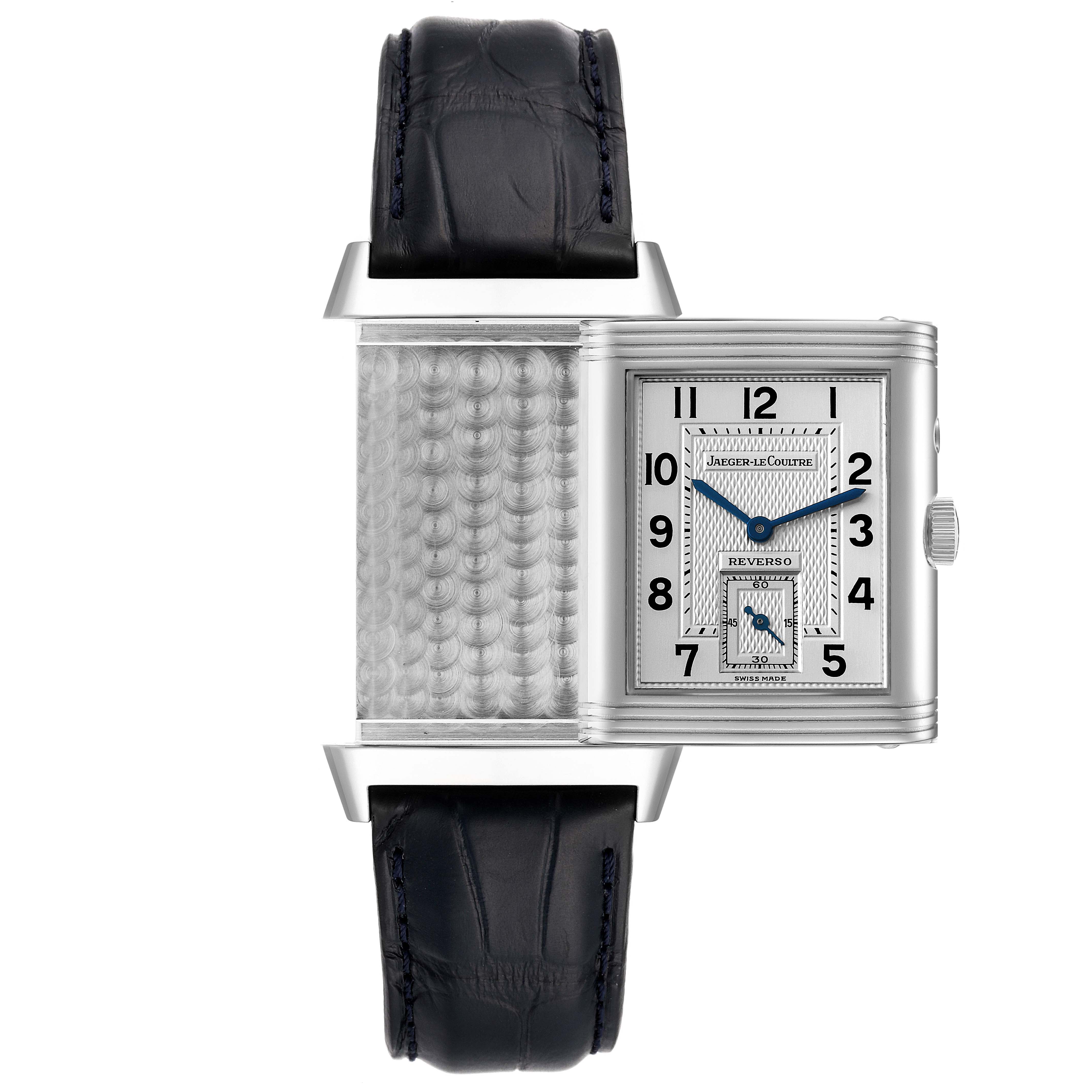 This image shows a front view of a Jaeger-LeCoultre Reverso watch with its case partially reversed, revealing the intricate back pattern.