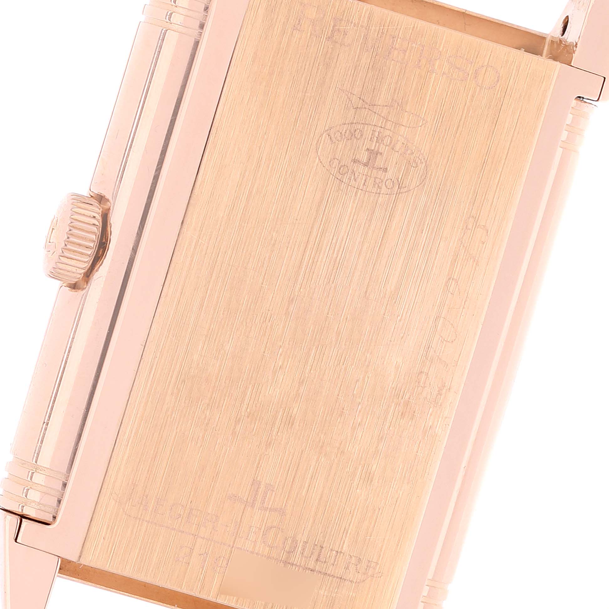 The image shows a close-up of the back of the Jaeger LeCoultre Reverso Q2702420 Men's Rose Gold Silver Dial Q2702420 Men's Rose Gold Silver Dial watch, highlighting the crown and case details.