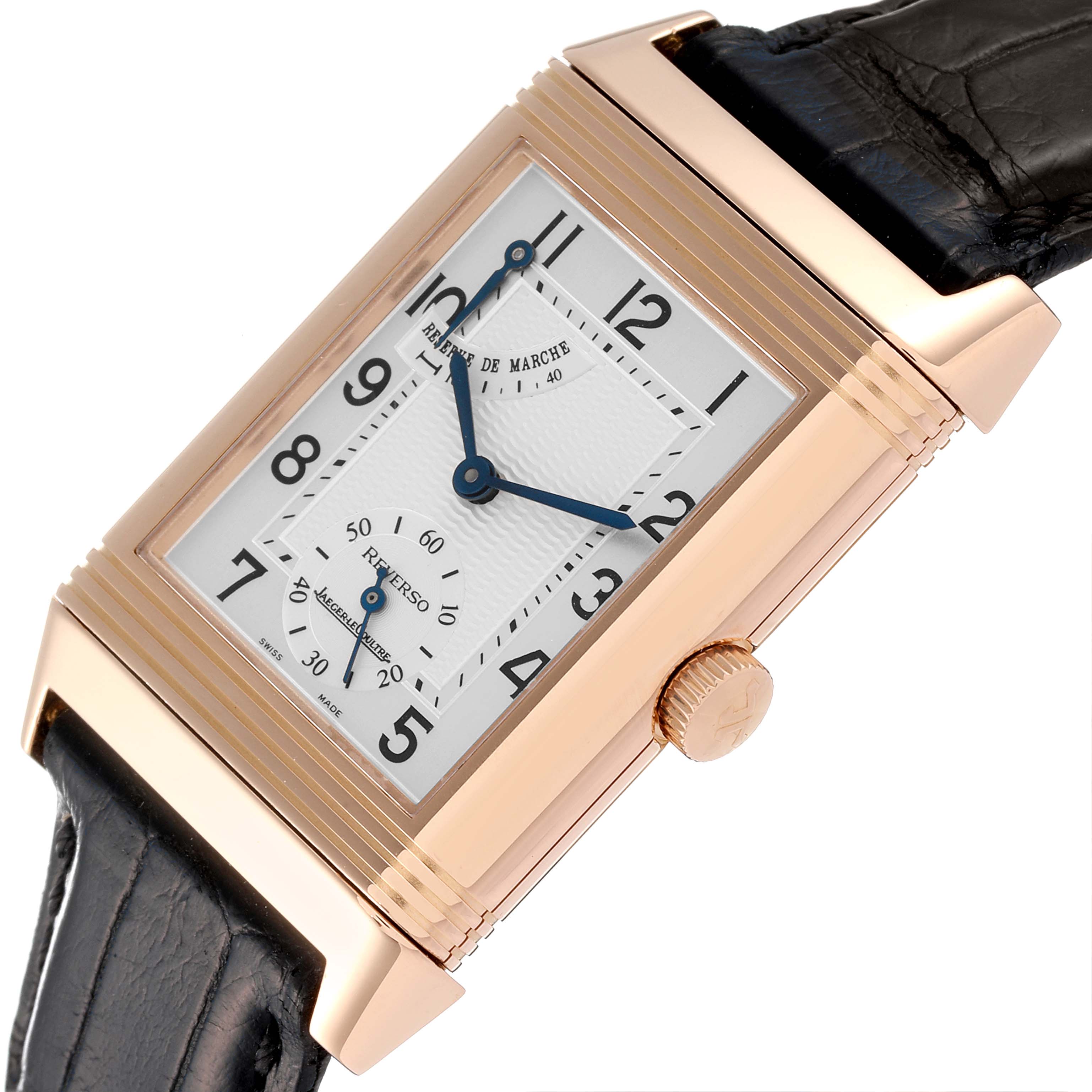 The image shows a close-up of the face and crown of a Jaeger-LeCoultre Reverso watch, angled slightly to the left.