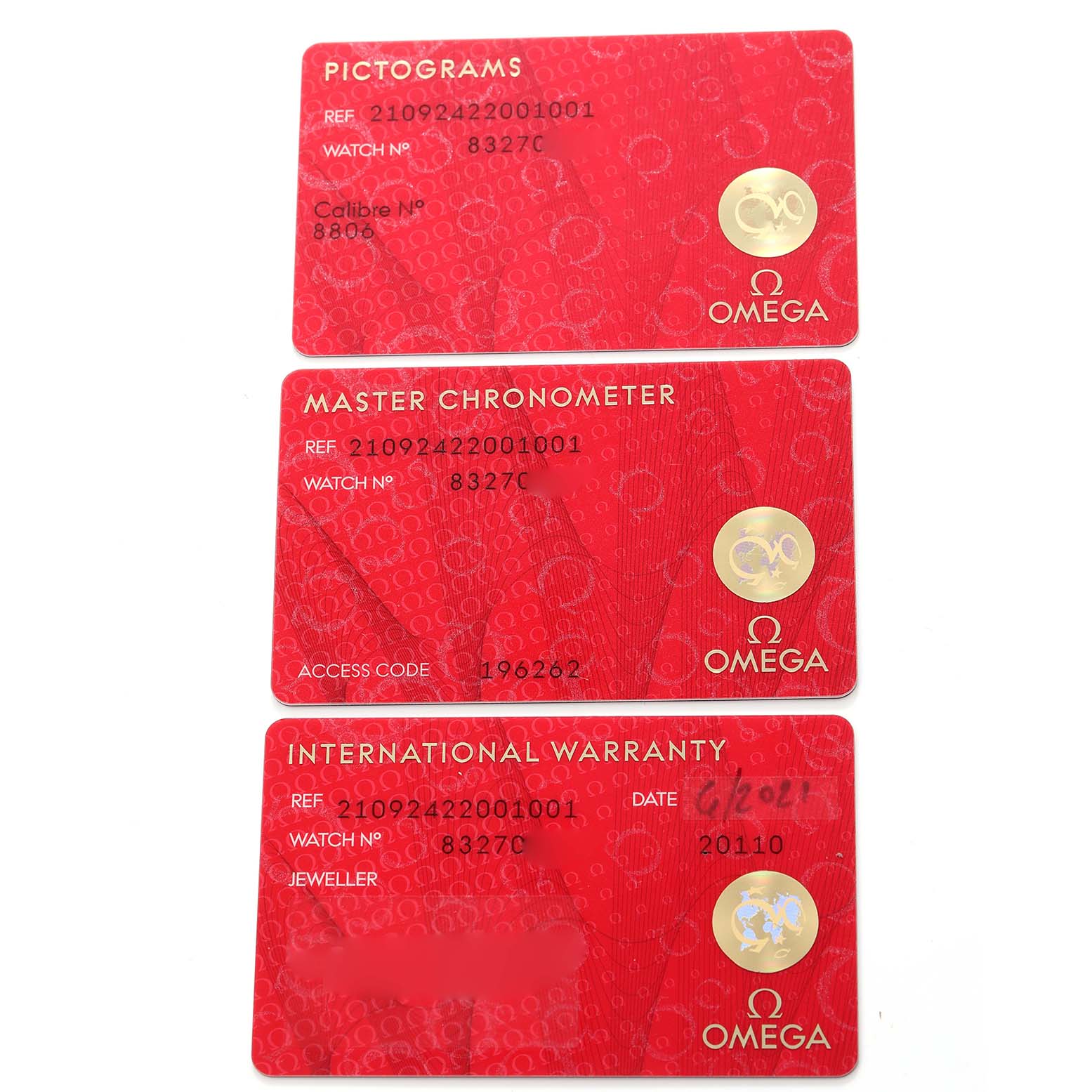 The image shows three red cards for the Omega Seamaster 210.92.42.20.01.001 Men's Titanium Brown Dial: pictograms, master chronometer, and international warranty.