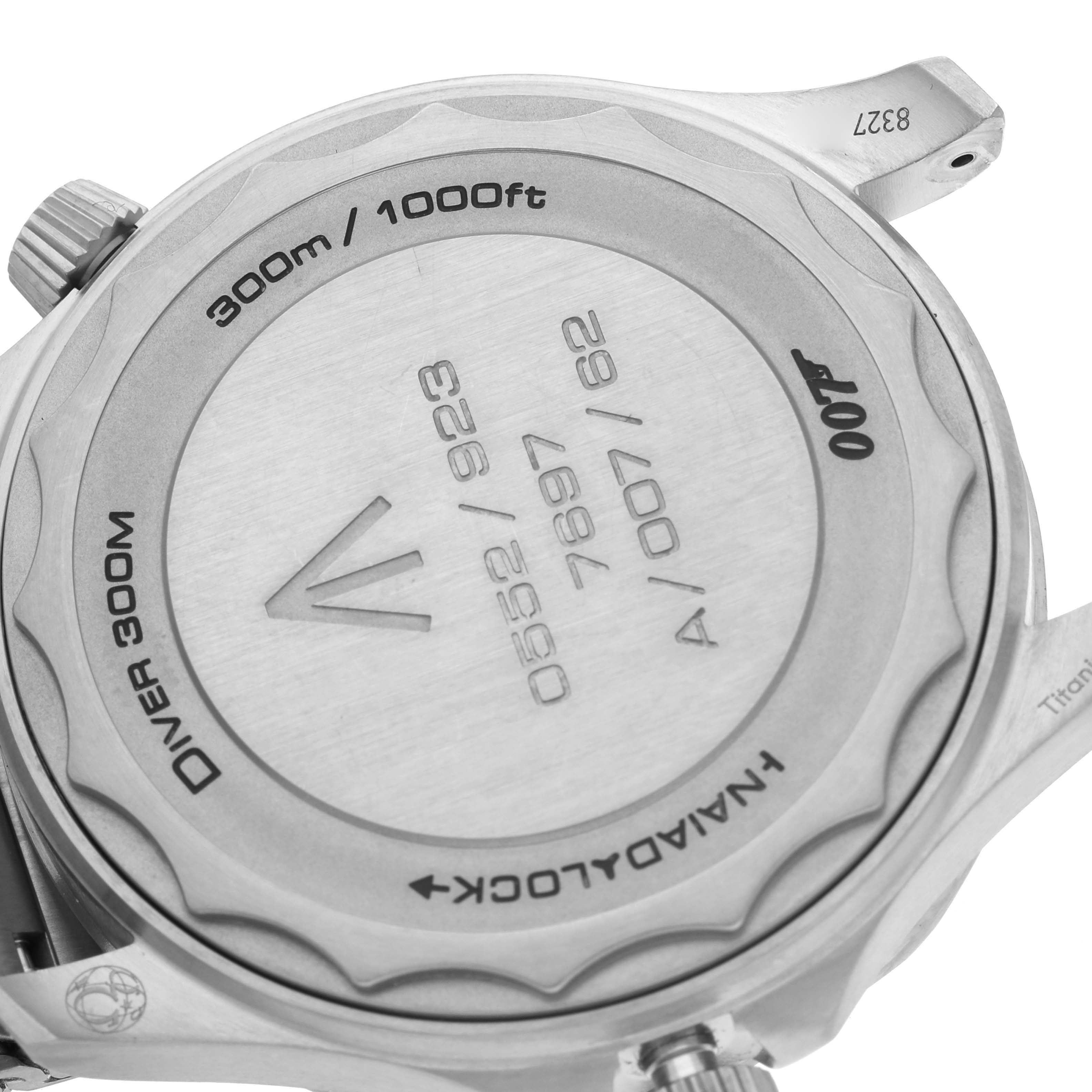 The image shows the back of an Omega Seamaster 210.92.42.20.01.001 Men's Titanium Brown Dial watch, showcasing its case details and engravings.