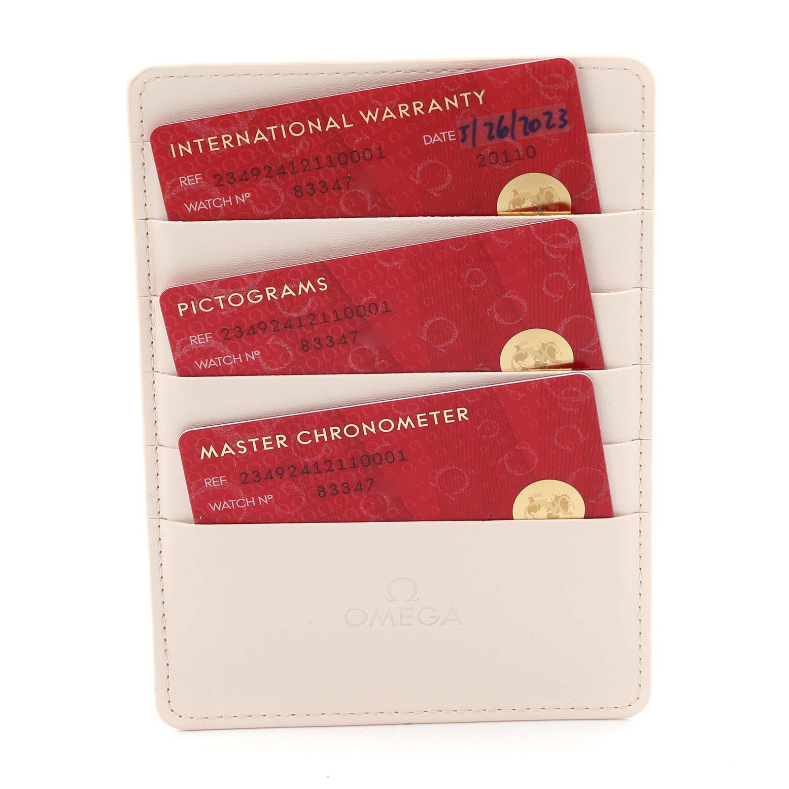 The image shows Omega Seamaster 234.92.41.21.10.001 Men's Bronze Brown Dial model warranty cards held in a white leather card holder.