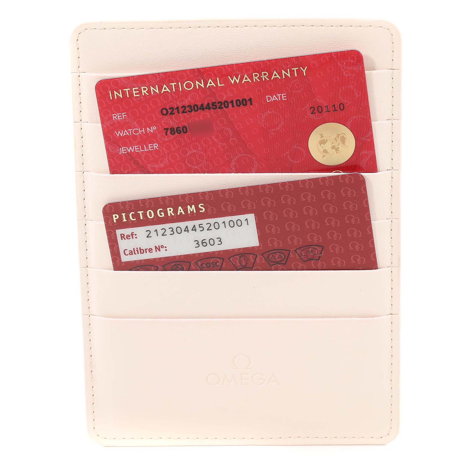 The image shows warranty and pictograms cards in a white holder for an Omega Seamaster 212.30.44.52.01.001 Men's Stainless Steel Black Dial 212.30.44.52.01.001 Men's Stainless Steel Black Dial model.