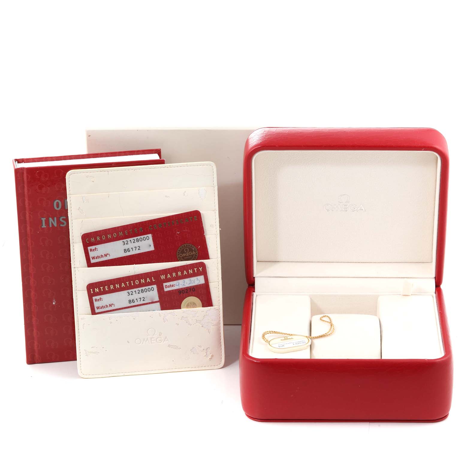 The image shows an Omega Speedmaster 3212.80.00 Men's Stainless Steel Blue Dial 3212.80.00 Men's Stainless Steel Blue Dial watch box, warranty cards, instructions book, and a tag, viewed from the front.