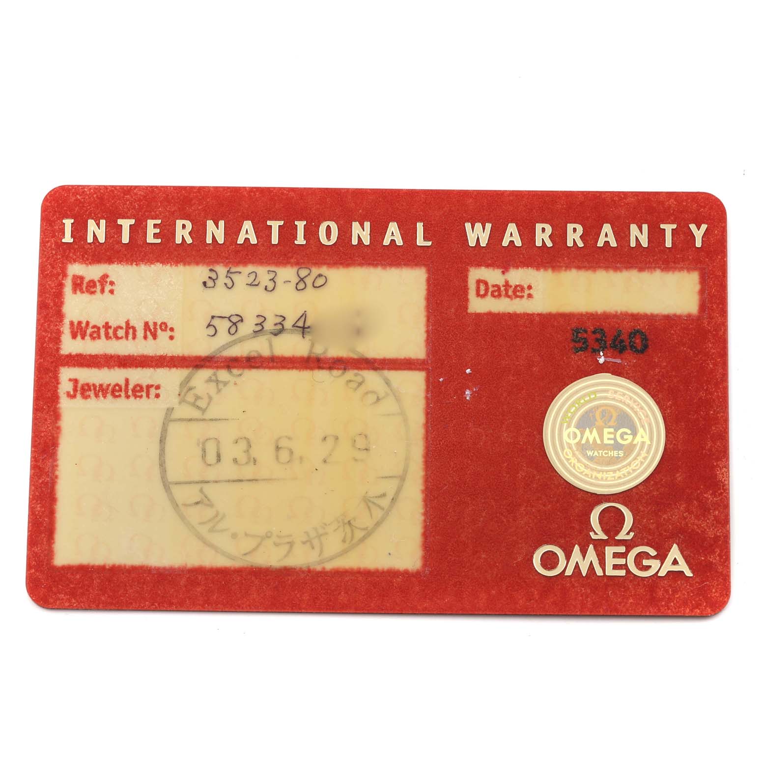 The image shows the international warranty card for an Omega Speedmaster 3523.80.00 Men's Stainless Steel Blue Dial 3523.80.00 Men's Stainless Steel Blue Dial watch, displaying reference, watch number, jeweler, and date details.
