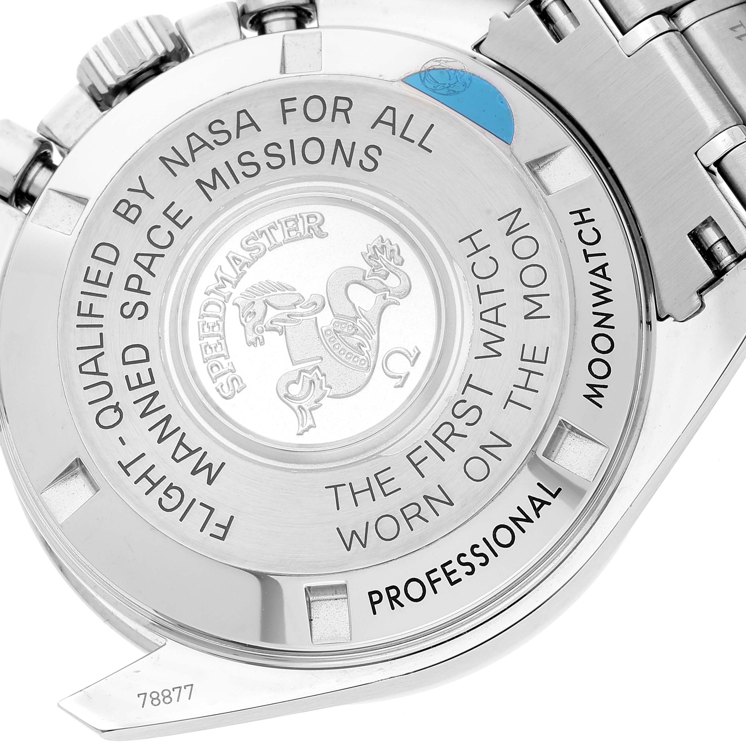 This image shows the back case of an Omega Speedmaster 311.30.42.30.01.005 Men's Stainless Steel Black Dial 311.30.42.30.01.005 Men's Stainless Steel Black Dial watch, highlighting its engraved details and metal bracelet.