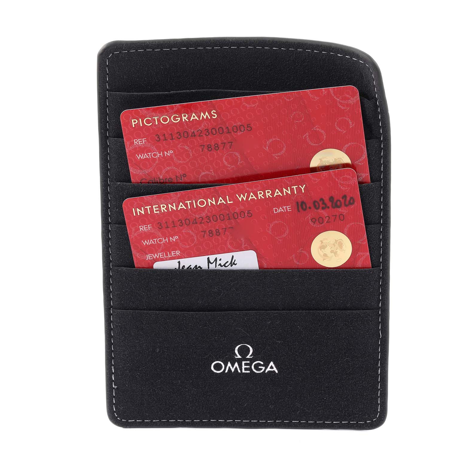 The image shows an Omega Speedmaster 311.30.42.30.01.005 Men's Stainless Steel Black Dial 311.30.42.30.01.005 Men's Stainless Steel Black Dial model's international warranty and pictograms cards in a black Omega cardholder.