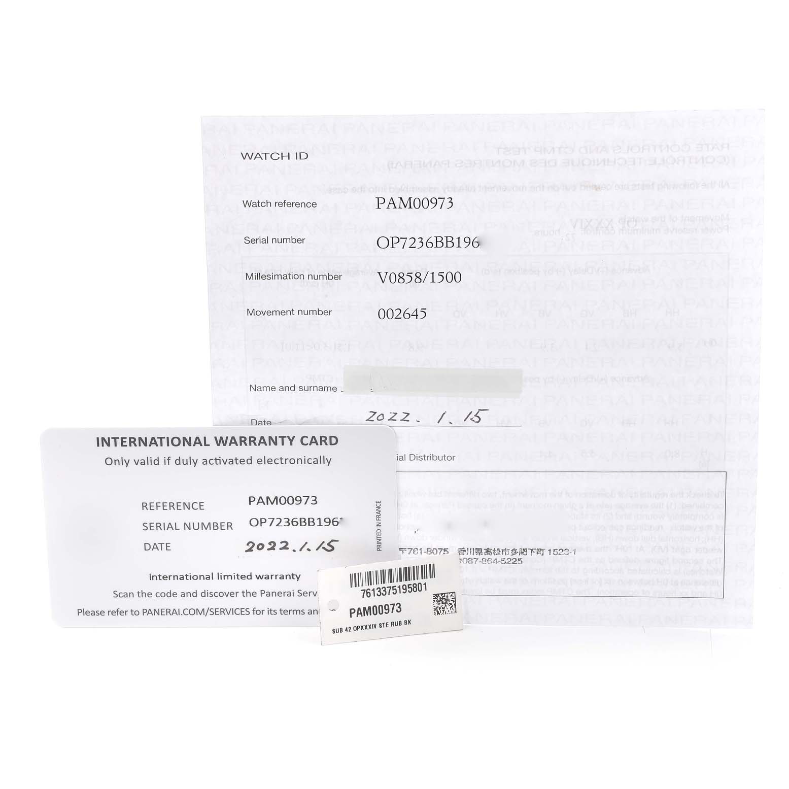 This image shows the warranty card, watch ID paperwork, and barcode tag for the Panerai Submersible PAM00973 Men's Titanium Black Dial PAM00973 Men's Titanium Black Dial model PAM00973.