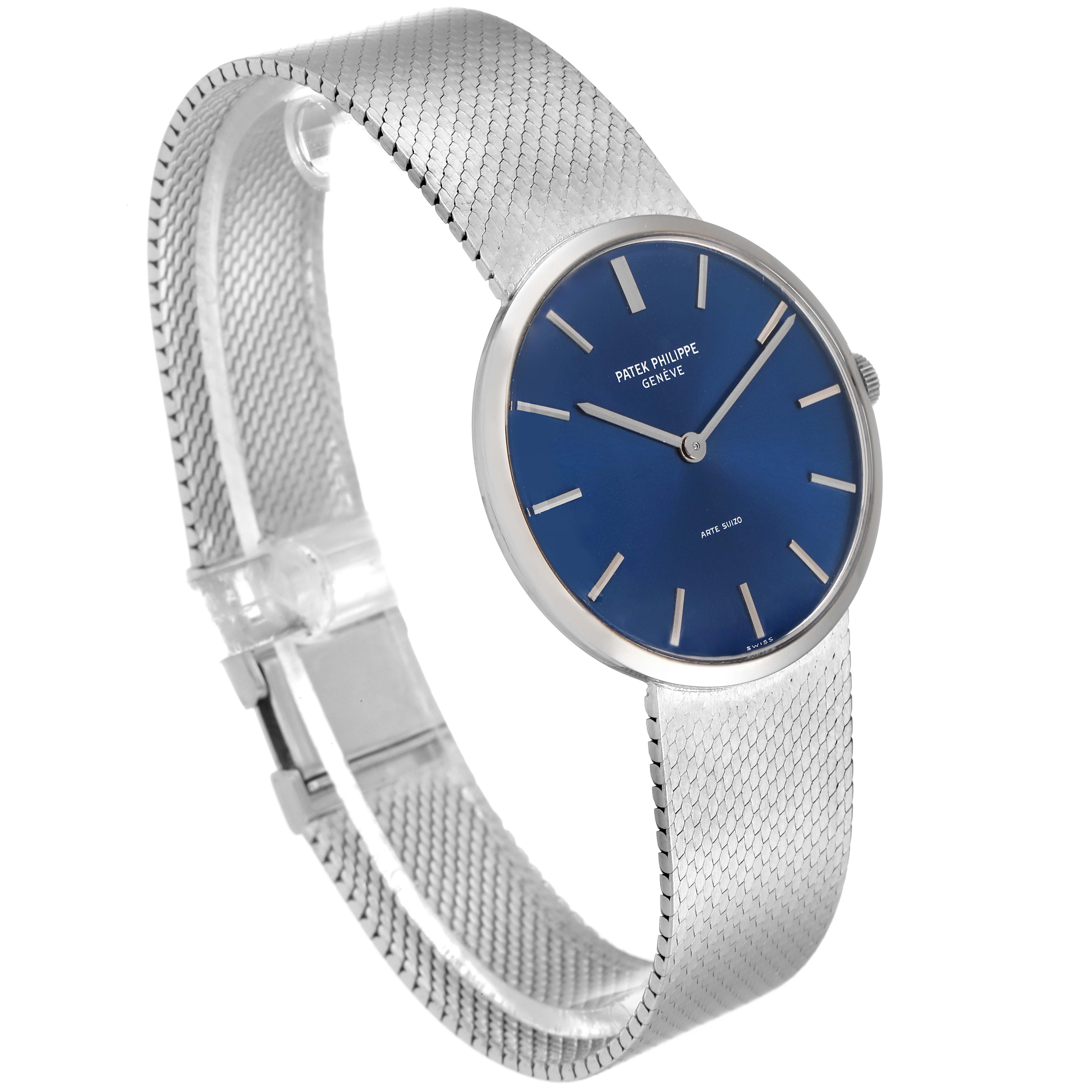 This image shows a side angle of a Vintage Patek Philippe watch, highlighting its blue dial and stainless steel mesh strap.