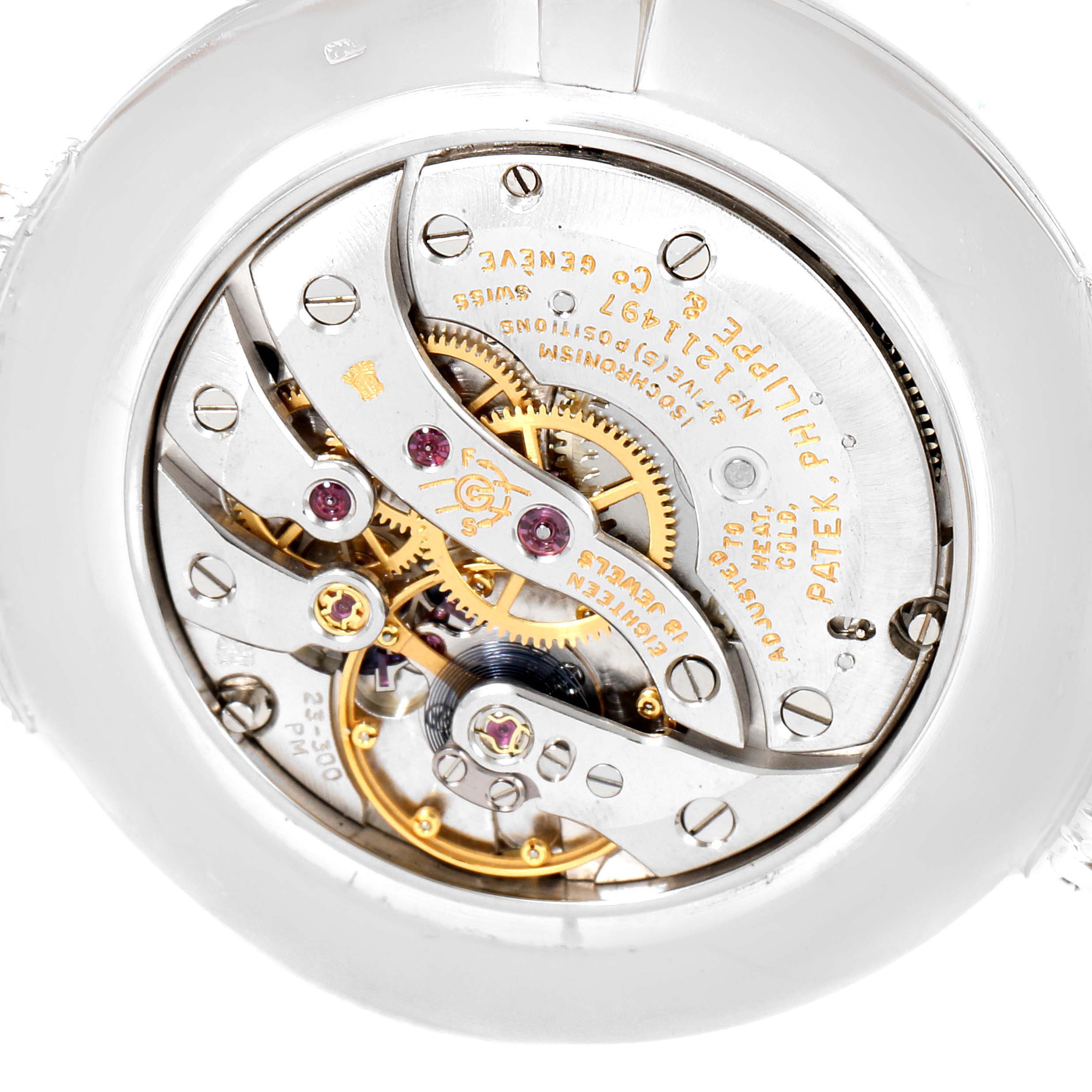 This image shows the intricate movement mechanism of a Vintage Patek Philippe watch, focusing on the back view.