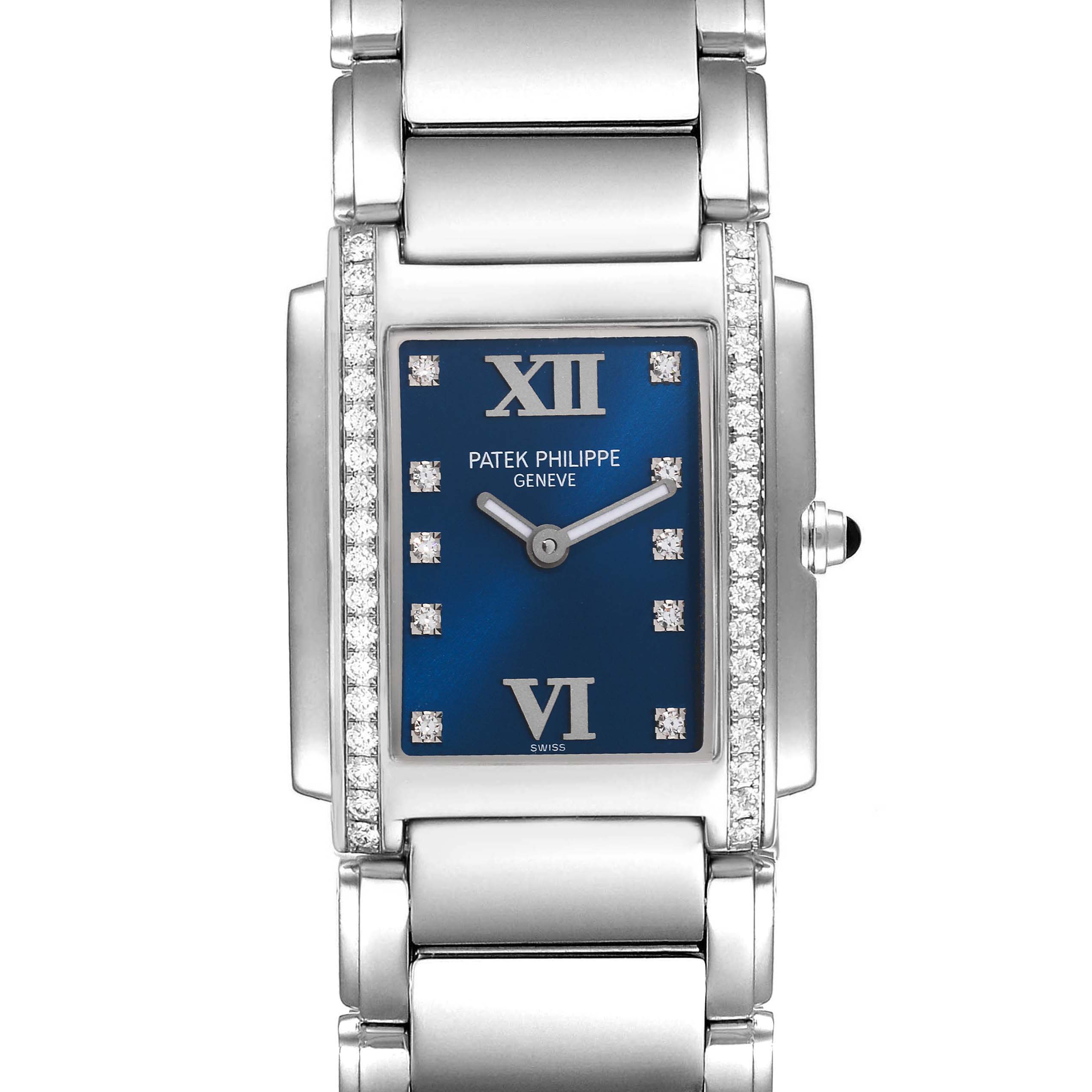 The image shows a front view of the Patek Philippe Twenty-4 4910-10A-012 Women's Stainless Steel Blue Dial 4910-10A-012 Women's Stainless Steel Blue Dial watch, highlighting its blue dial, diamond markers, and stainless steel bracelet.