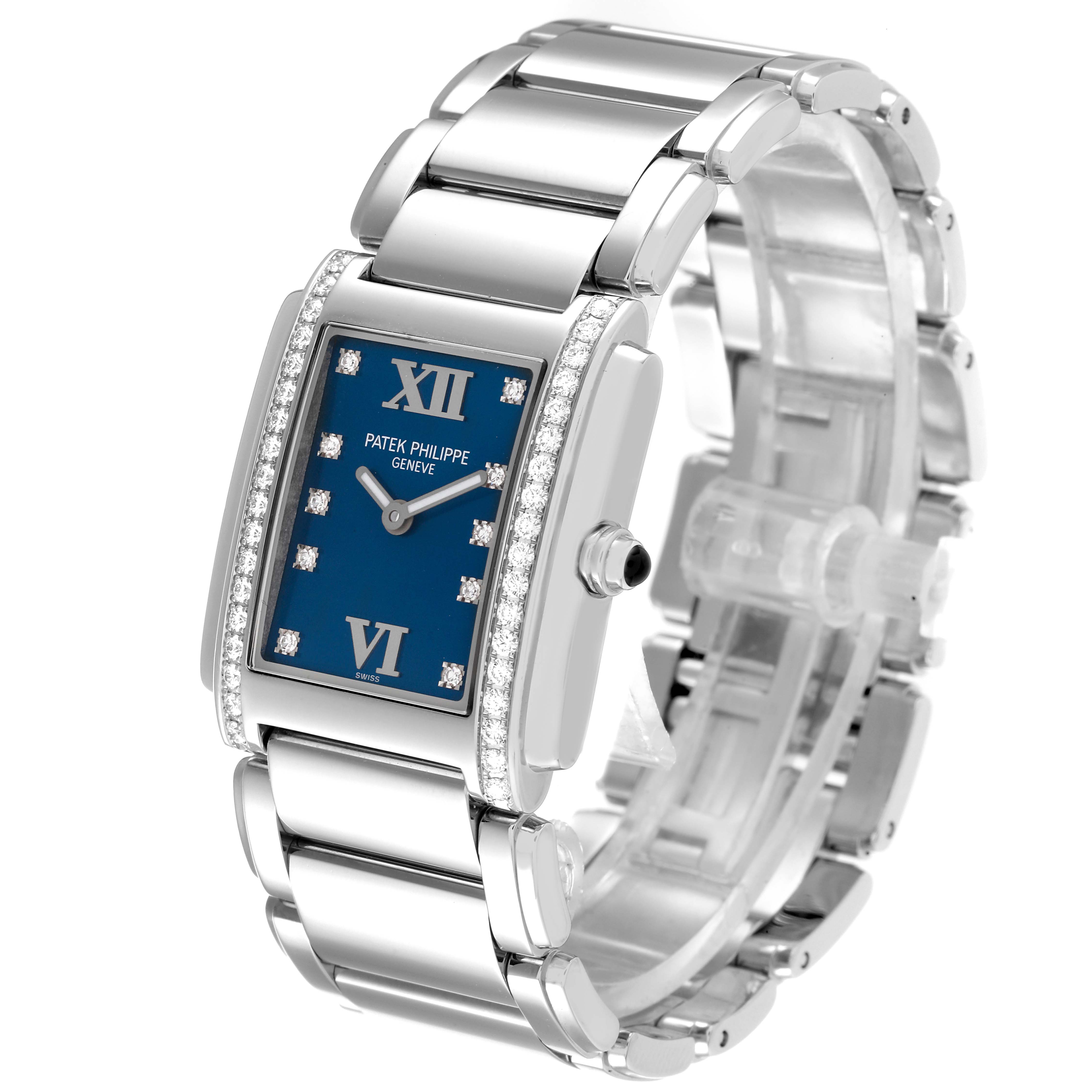 The image shows a Patek Philippe Twenty-4 4910-10A-012 Women's Stainless Steel Blue Dial 4910-10A-012 Women's Stainless Steel Blue Dial watch at an angle highlighting its face, bracelet, and side profile.