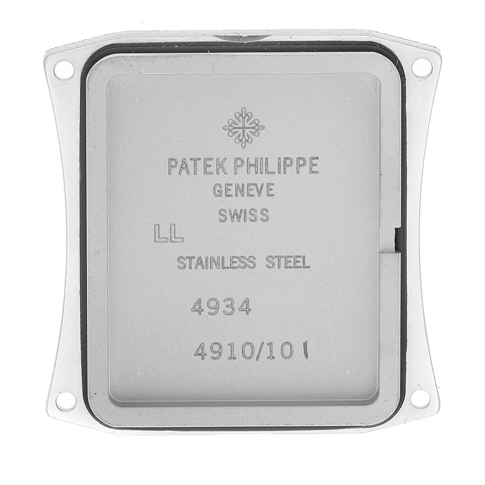 This image shows the back case of a Twenty-4 model watch by Patek Philippe with inscriptions.