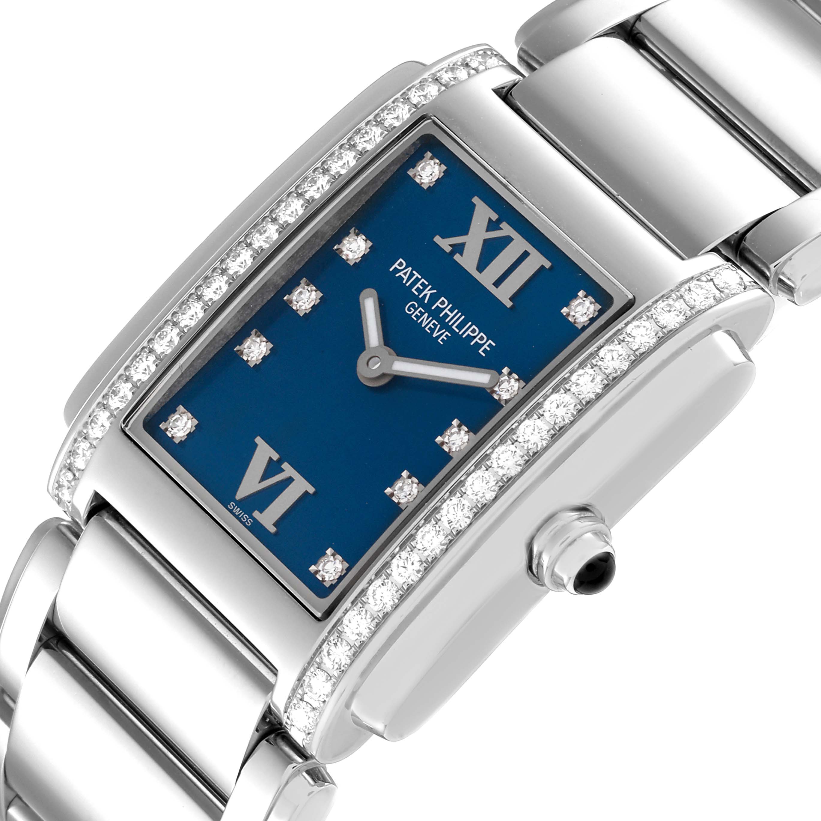 This image shows a close-up angle of a Patek Philippe Twenty-4 4910-10A-012 Women's Stainless Steel Blue Dial 4910-10A-012 Women's Stainless Steel Blue Dial watch, highlighting its diamond-studded bezel and blue dial.