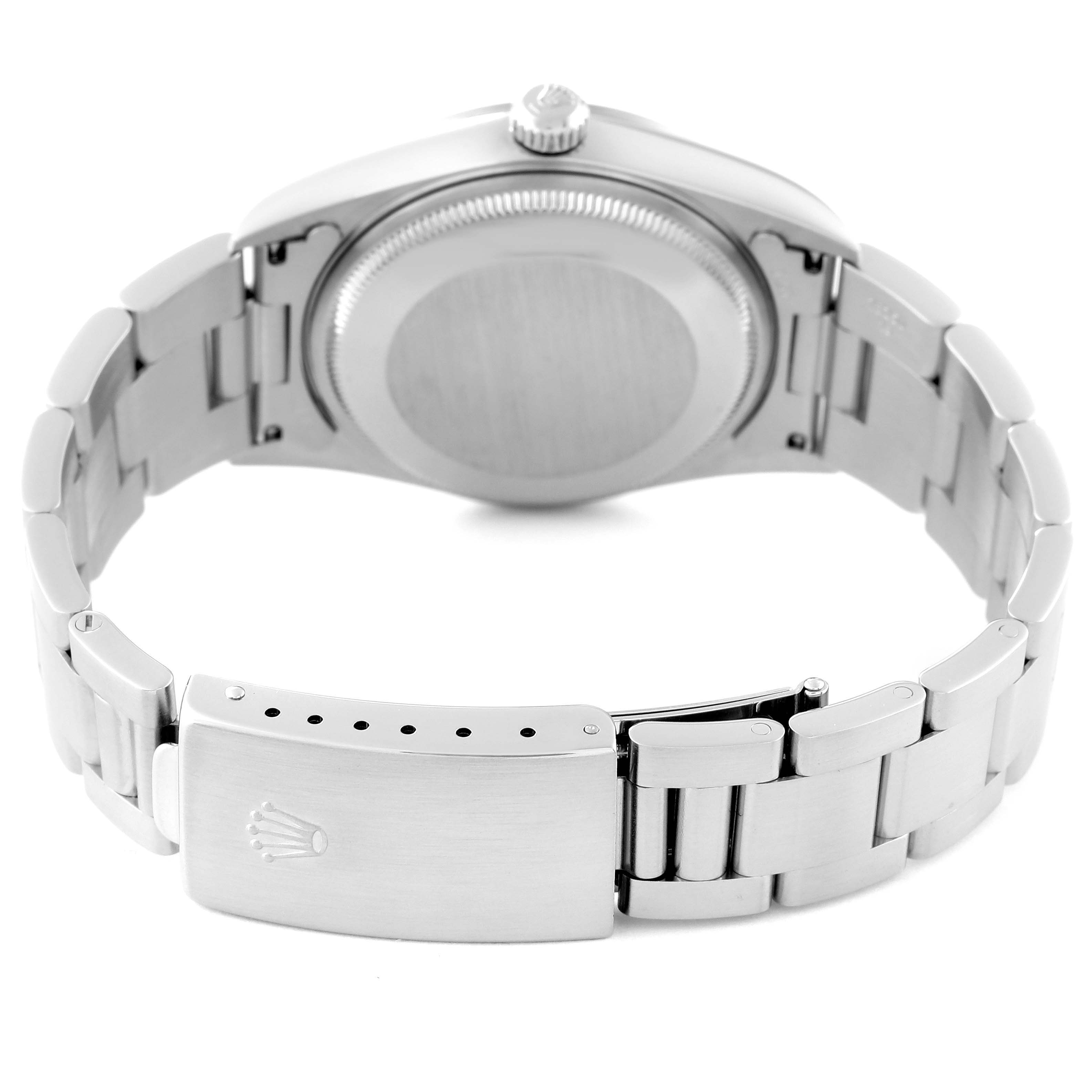 The image shows the backside and bracelet clasp of the Rolex Air-King 14000M Men's Stainless Steel Blue Dial 14000M Men's Stainless Steel Blue Dial watch.