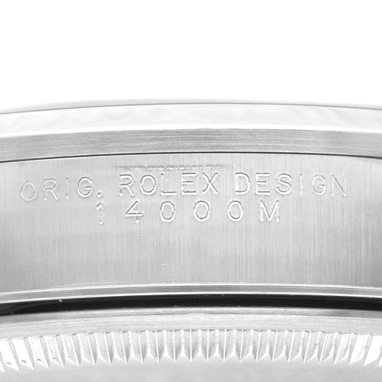 This image shows a close-up of the side engraving and bezel of a Rolex Air-King 14000M Men's Stainless Steel Blue Dial 14000M Men's Stainless Steel Blue Dial watch.