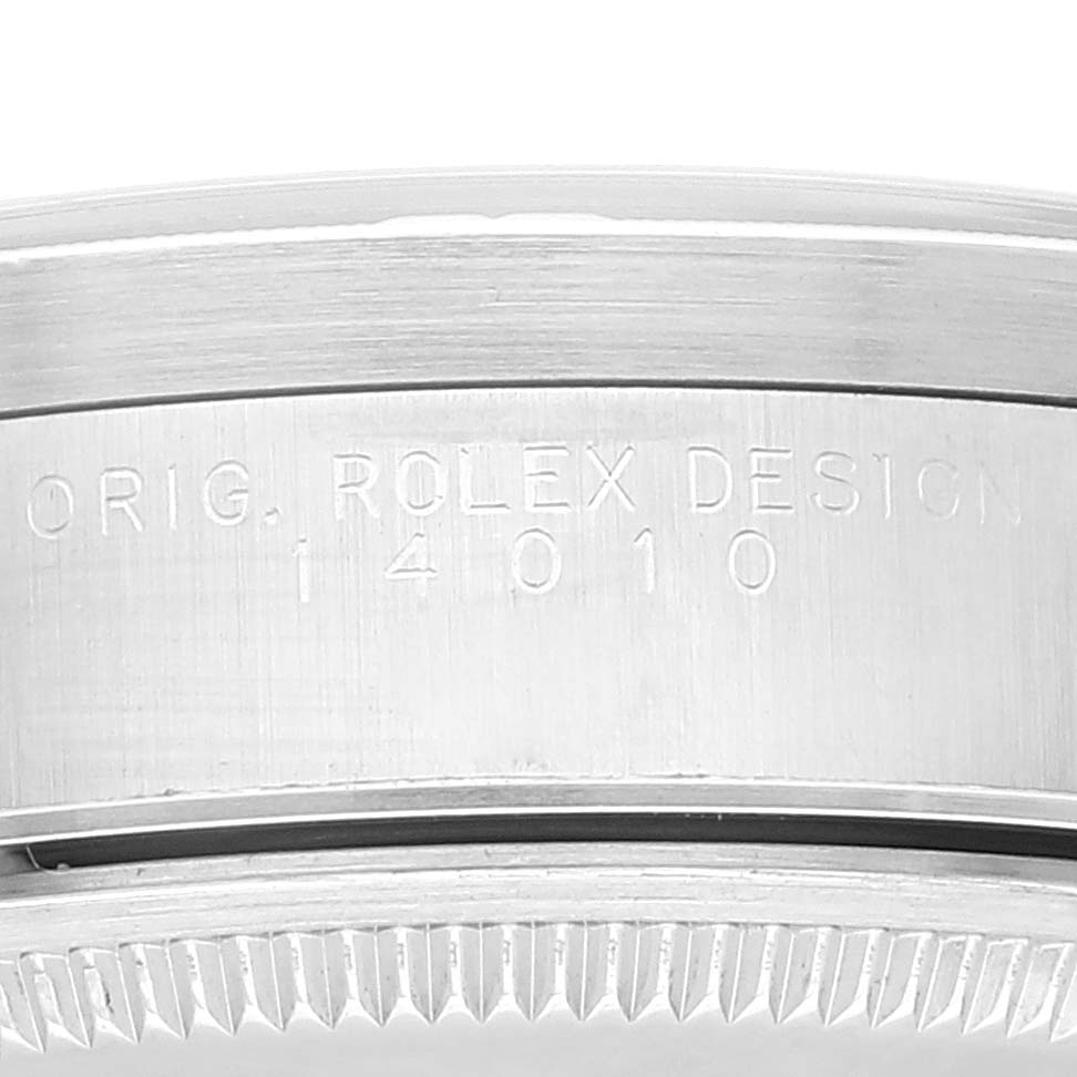 This close-up image shows the side engraving on the bezel of a Rolex Air-King 14010 Men's Stainless Steel Blue Dial 14010 Men's Stainless Steel Blue Dial watch.