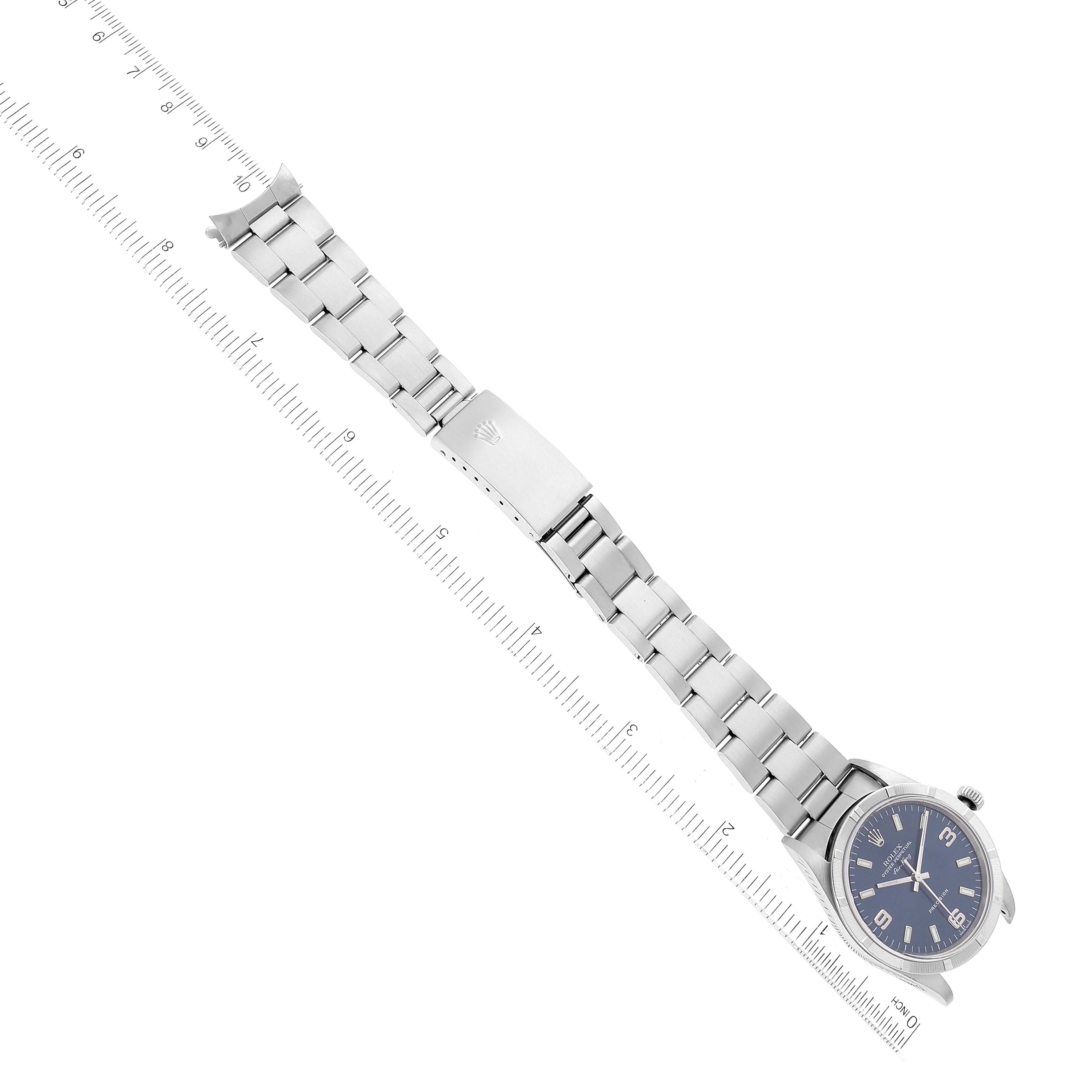 The image shows the Rolex Air-King 14010 Men's Stainless Steel Blue Dial 14010 Men's Stainless Steel Blue Dial watch laid flat, prominently displaying its dial, bracelet, and clasp.