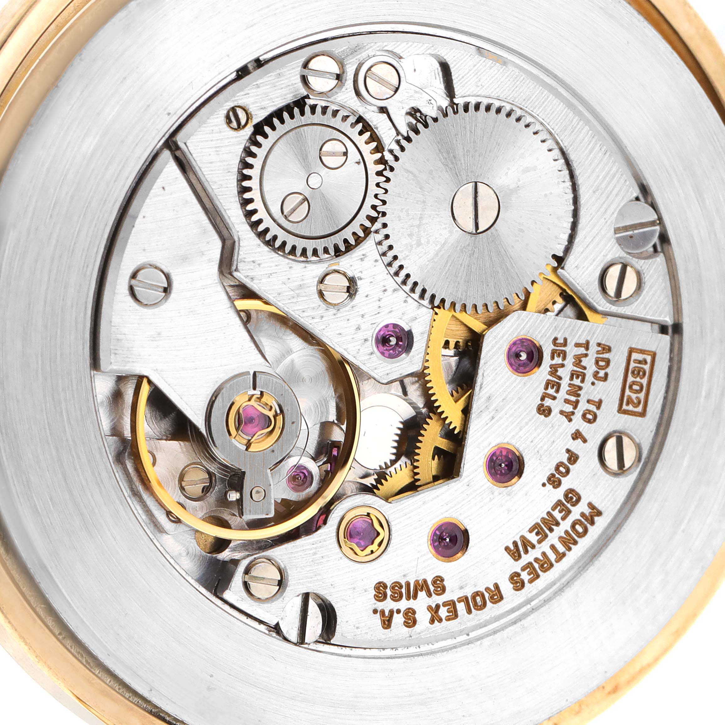 This image shows the internal mechanics and movement of a Rolex Cellini 5112 Men's Yellow Gold Champagne Dial 5112 Men's Yellow Gold Champagne Dial watch viewed from the back.