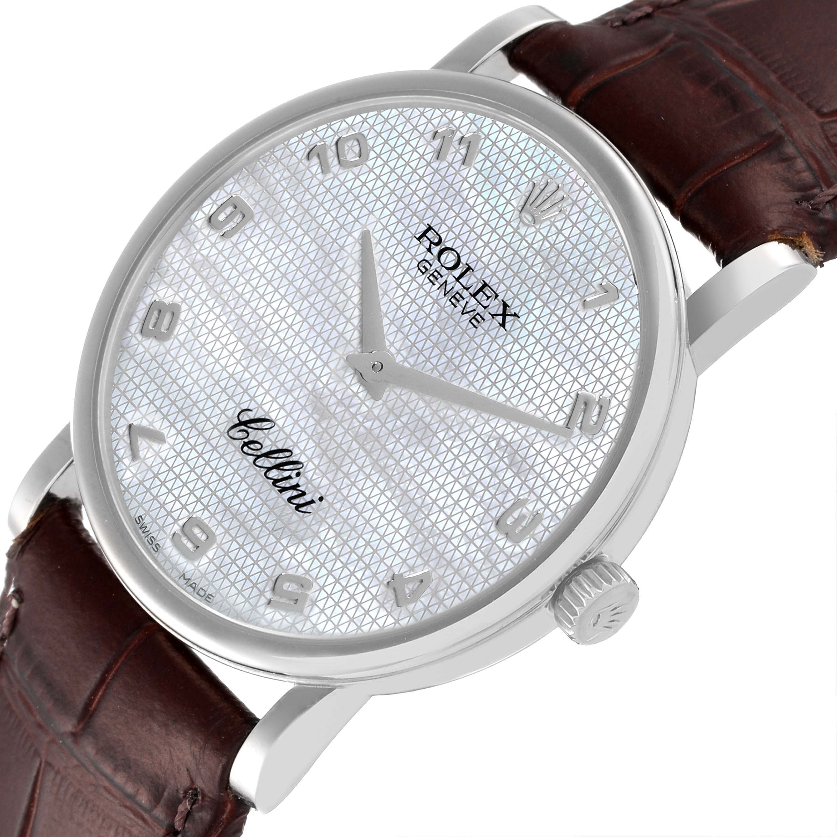 The Rolex Cellini 5115 Men's White Gold Mother of Pearl Dial 5115 Men's White Gold Mother of Pearl Dial watch is shown at a slight angle, revealing the dial, hands, crown, and part of the leather strap.