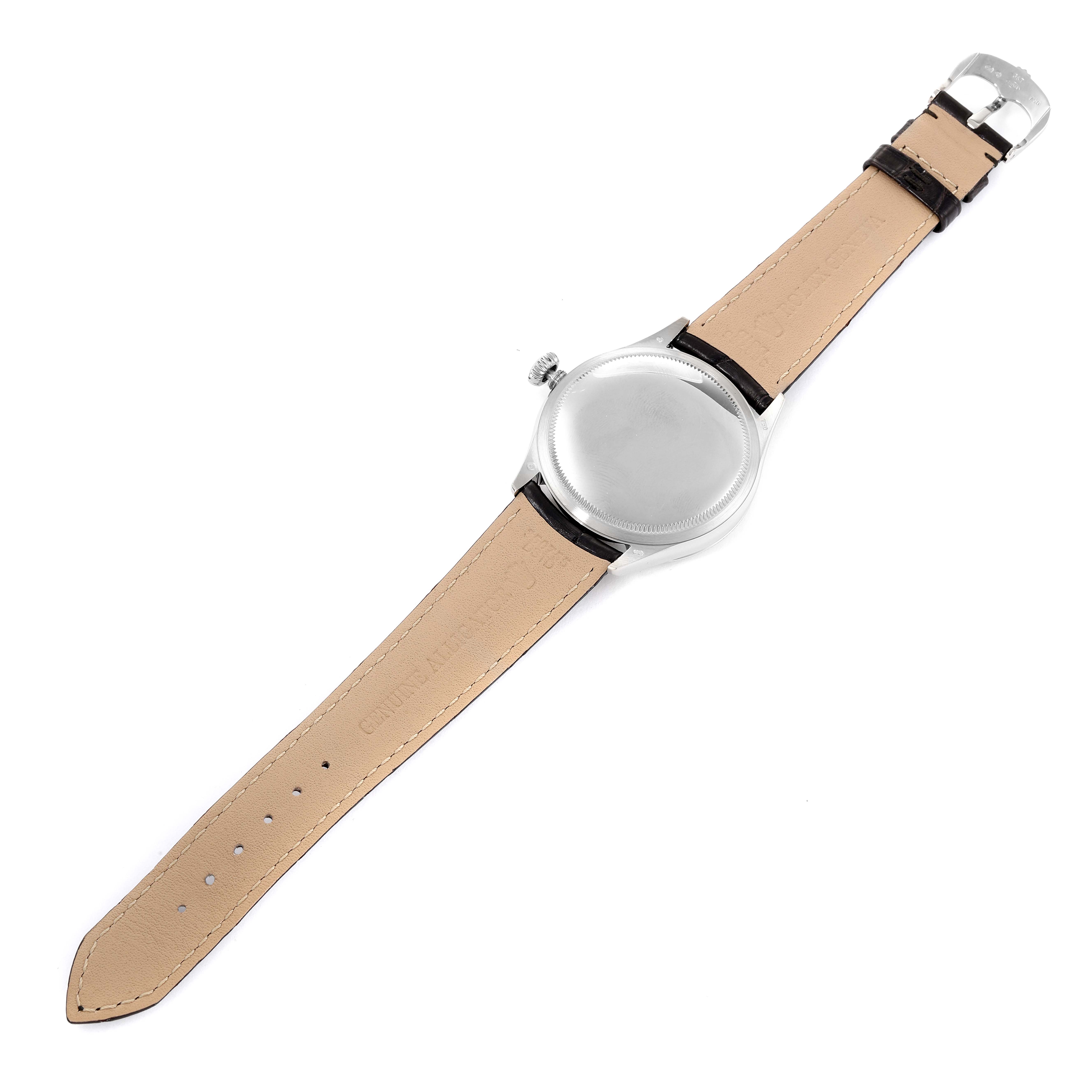 This image shows the back and strap of a Rolex Cellini 50609RBR Men's White Gold Black Dial 50609RBR Men's White Gold Black Dial watch laid flat, showcasing the back case and leather band.