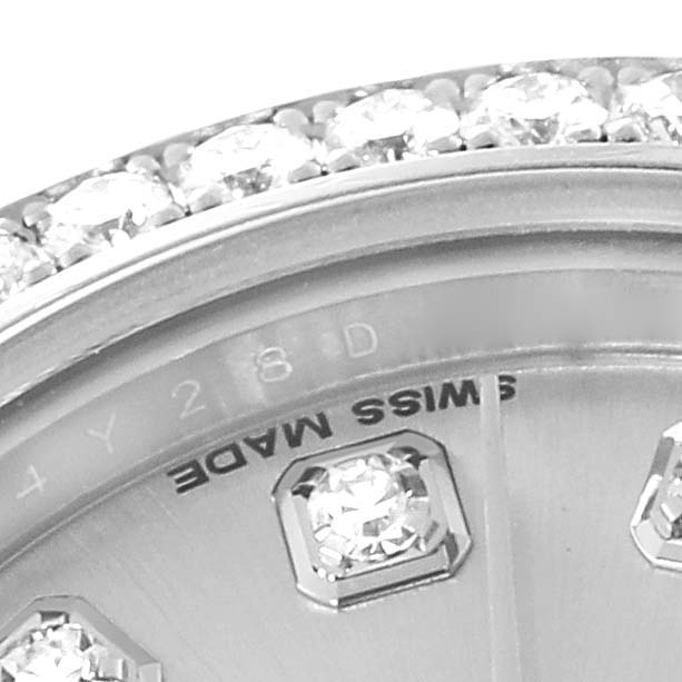 The image shows a close-up of the bezel and dial of a Rolex Datejust 179384 Women's Stainless Steel Silver Dial 179384 Women's Stainless Steel Silver Dial watch with a diamond-studded bezel.