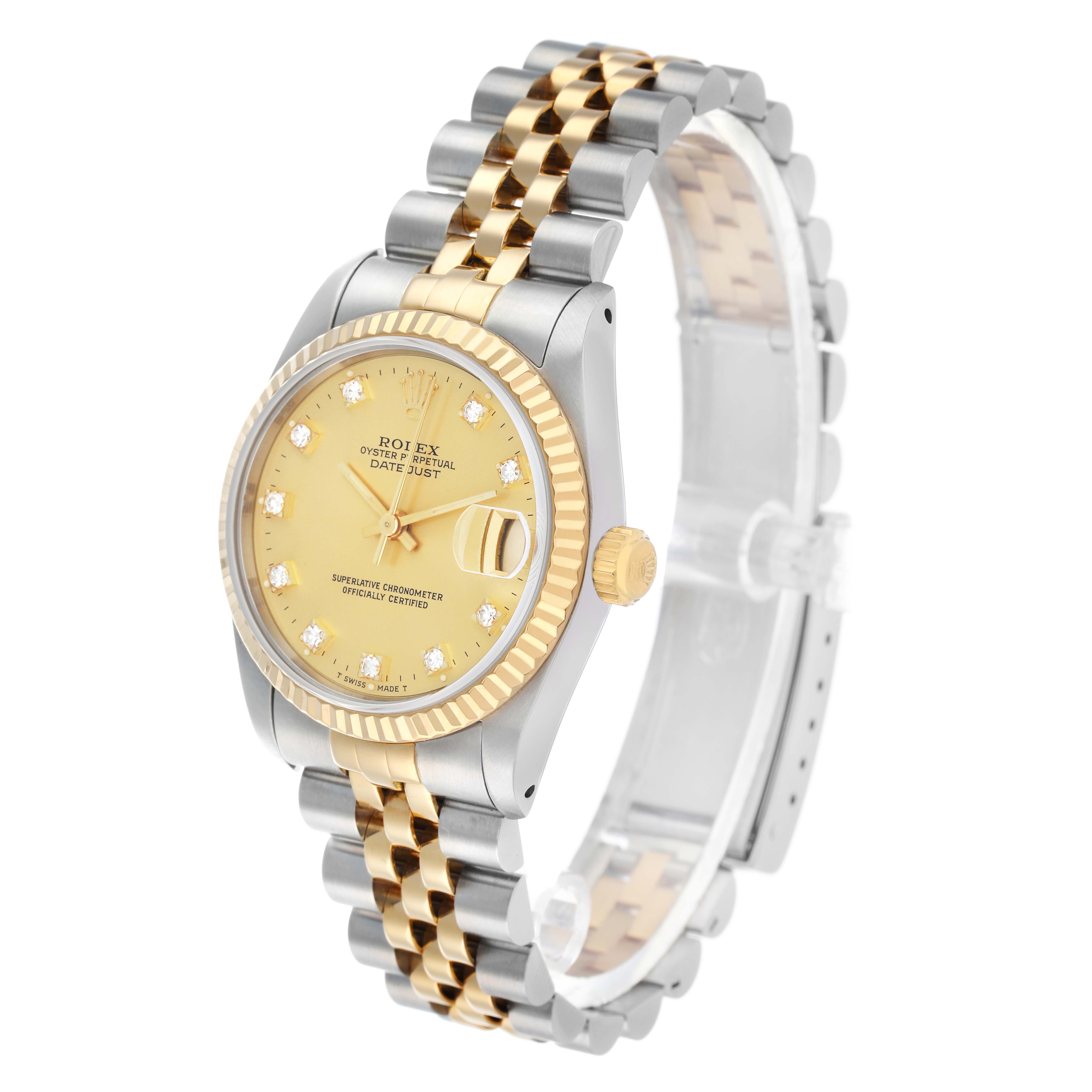 The Rolex Datejust 68273 Women's Steel and Gold (two tone) Champagne Dial watch is shown from a three-quarter angle displaying the face, bezel, crown, and part of the bracelet.