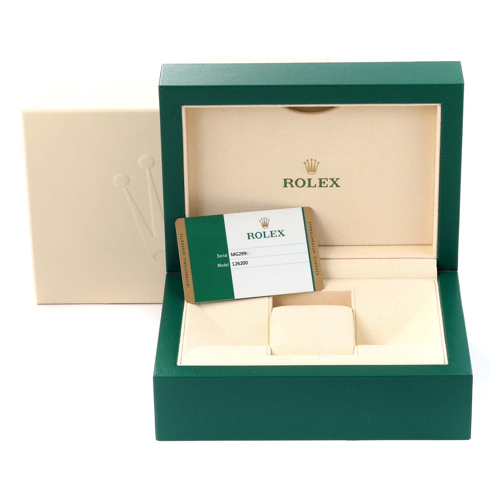 The image shows the open green and cream box and the warranty card of a Rolex Datejust 126200 Men's Stainless Steel Black Dial 126200 Men's Stainless Steel Black Dial model 126200.