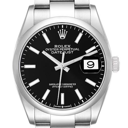 The image shows a front view of the Rolex Datejust watch, highlighting the black dial, date window, crown, and stainless steel bracelet.