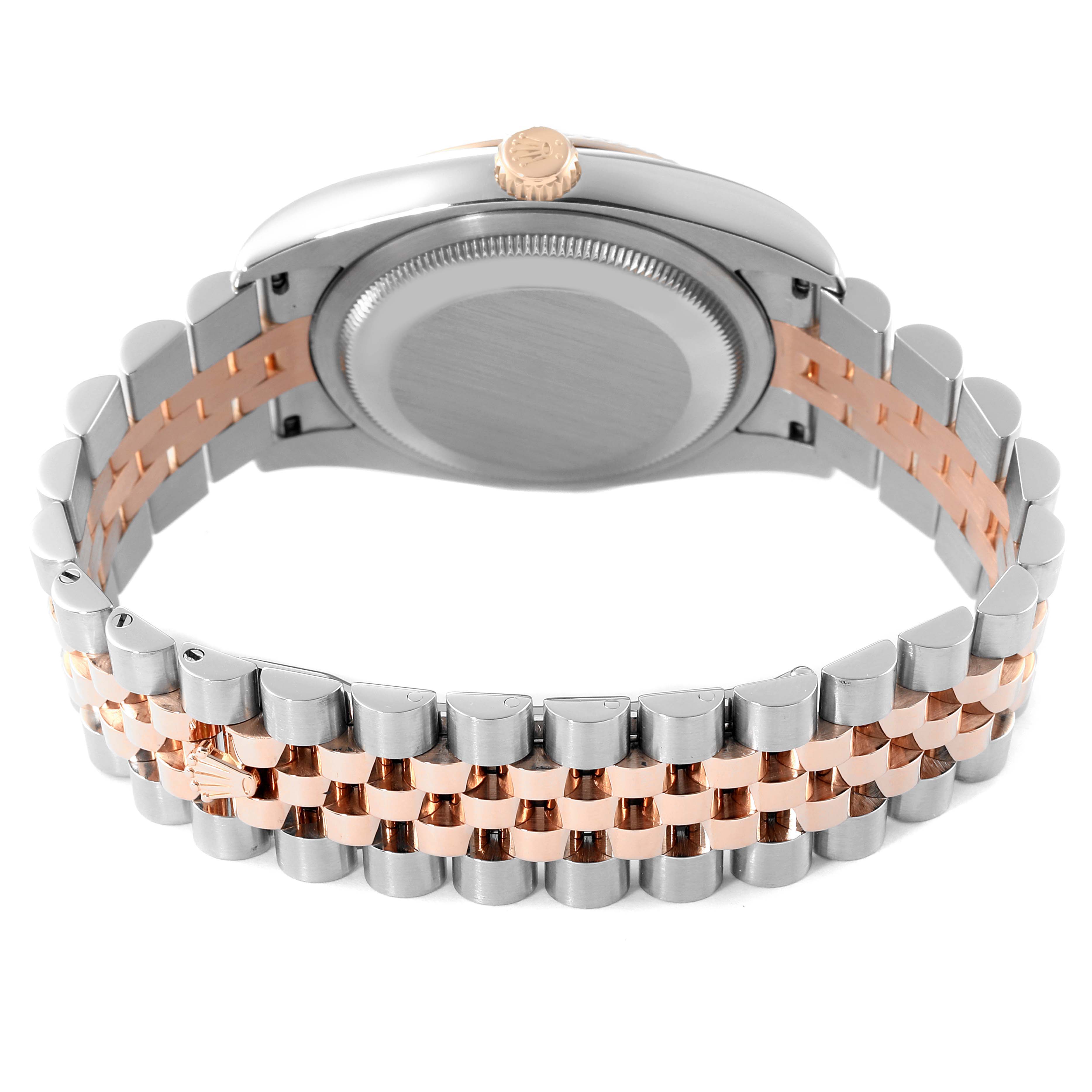 A Rolex Datejust 116231 Men's Steel and Gold (two tone) Silver Dial 116231 Men's Steel and Gold (two tone) Silver Dial watch shown from the rear angle, displaying the two-tone bracelet and case back.