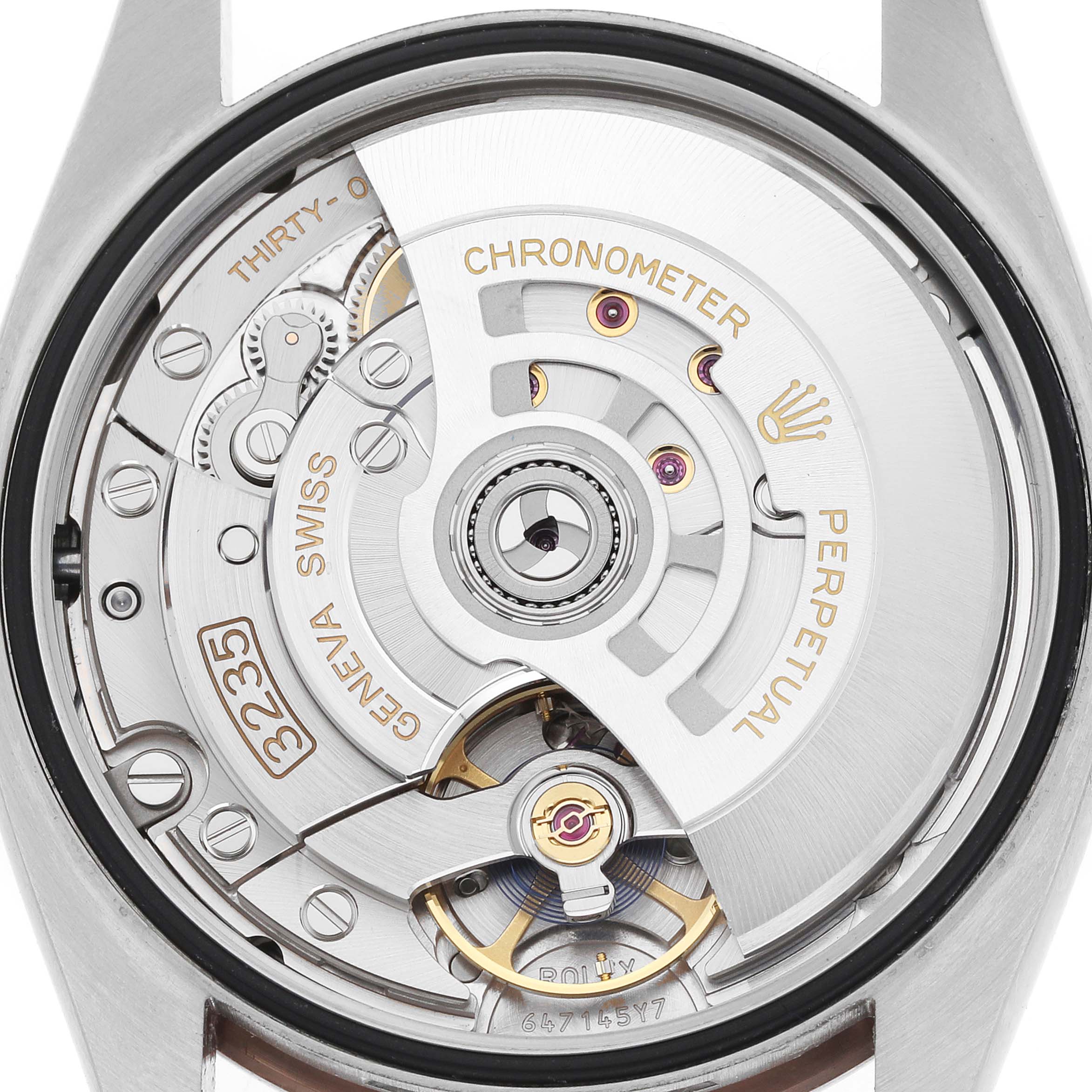 The image shows the movement of a Rolex Datejust 126201 Men's Steel and Gold (two tone) Grey Dial watch, highlighting the rotor, gears, and "Chronometer" marking.