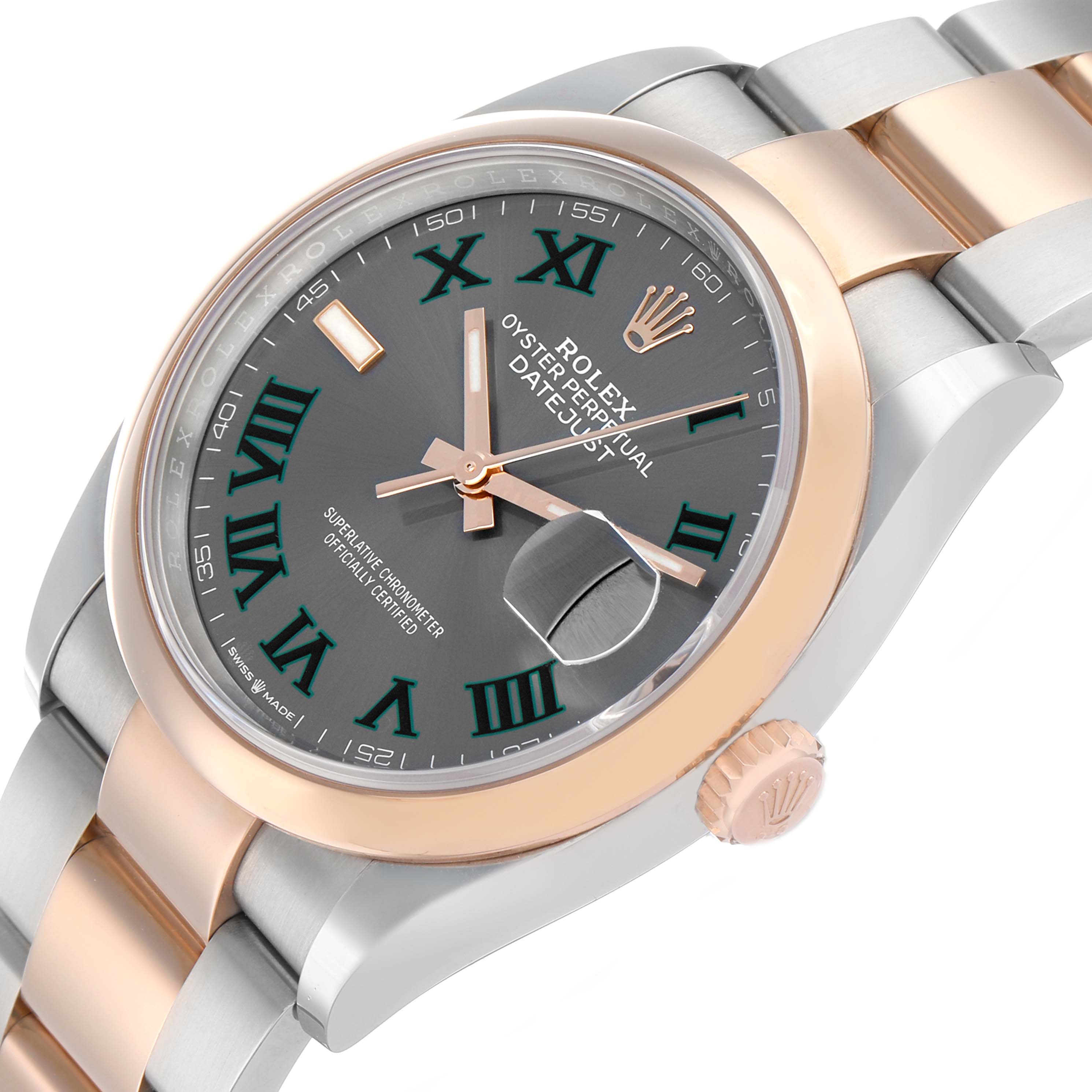 The Rolex Datejust 126201 Men's Steel and Gold (two tone) Grey Dial watch is shown from an angled close-up, featuring the dial, bezel, crown, and part of the bracelet.