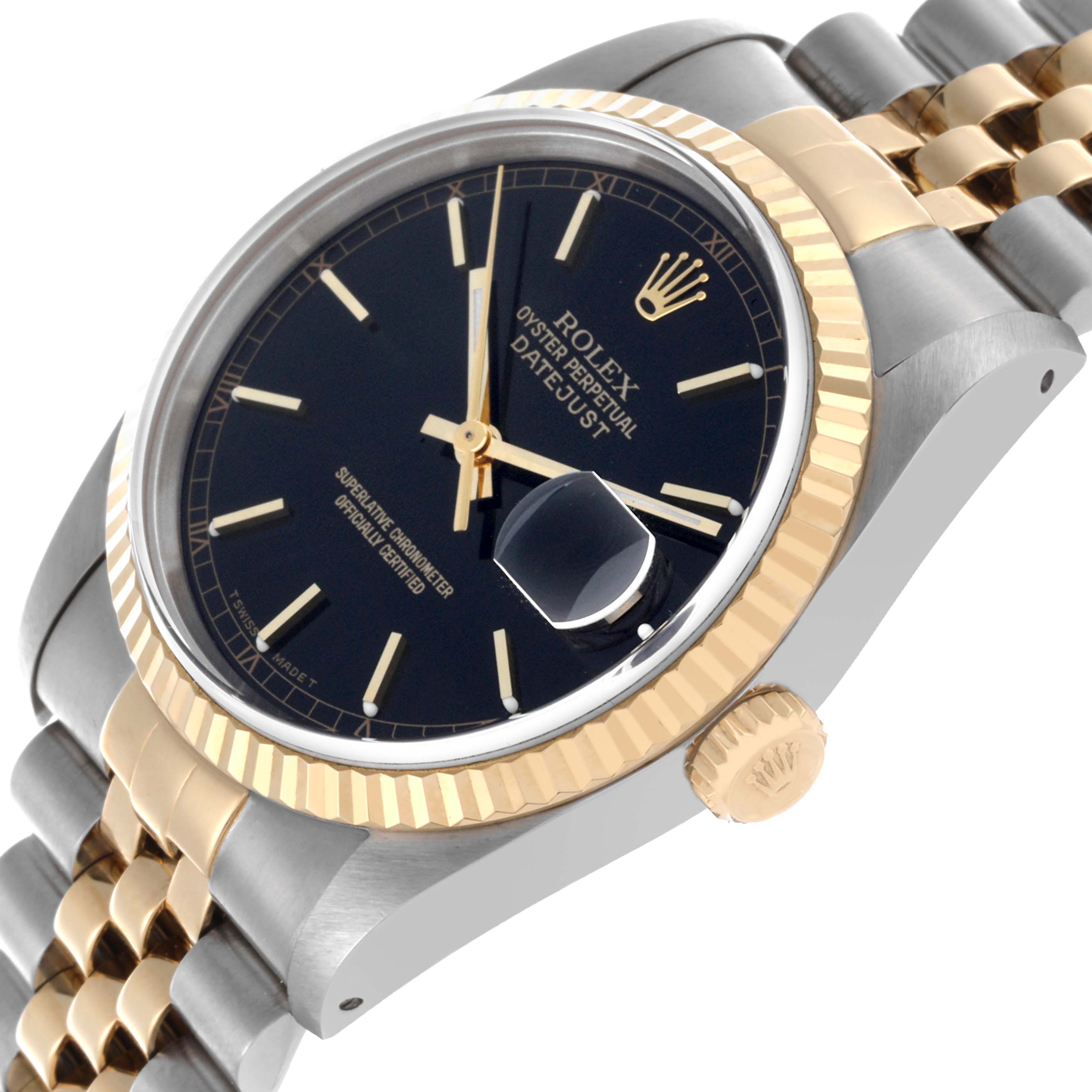 The Rolex Datejust 16233 Men's Steel and Gold (two tone) Black Dial watch is viewed from a three-quarter angle, showing the dial, bezel, crown, and part of the bracelet.