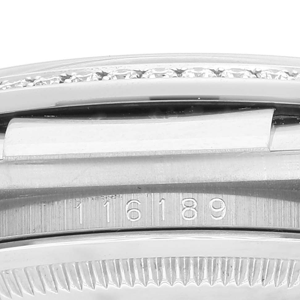 This close-up image of a Rolex Datejust 116189 Men's White Gold Mother of Pearl Dial 116189 Men's White Gold Mother of Pearl Dial watch shows the model number "116189" engraved on the side of the case.