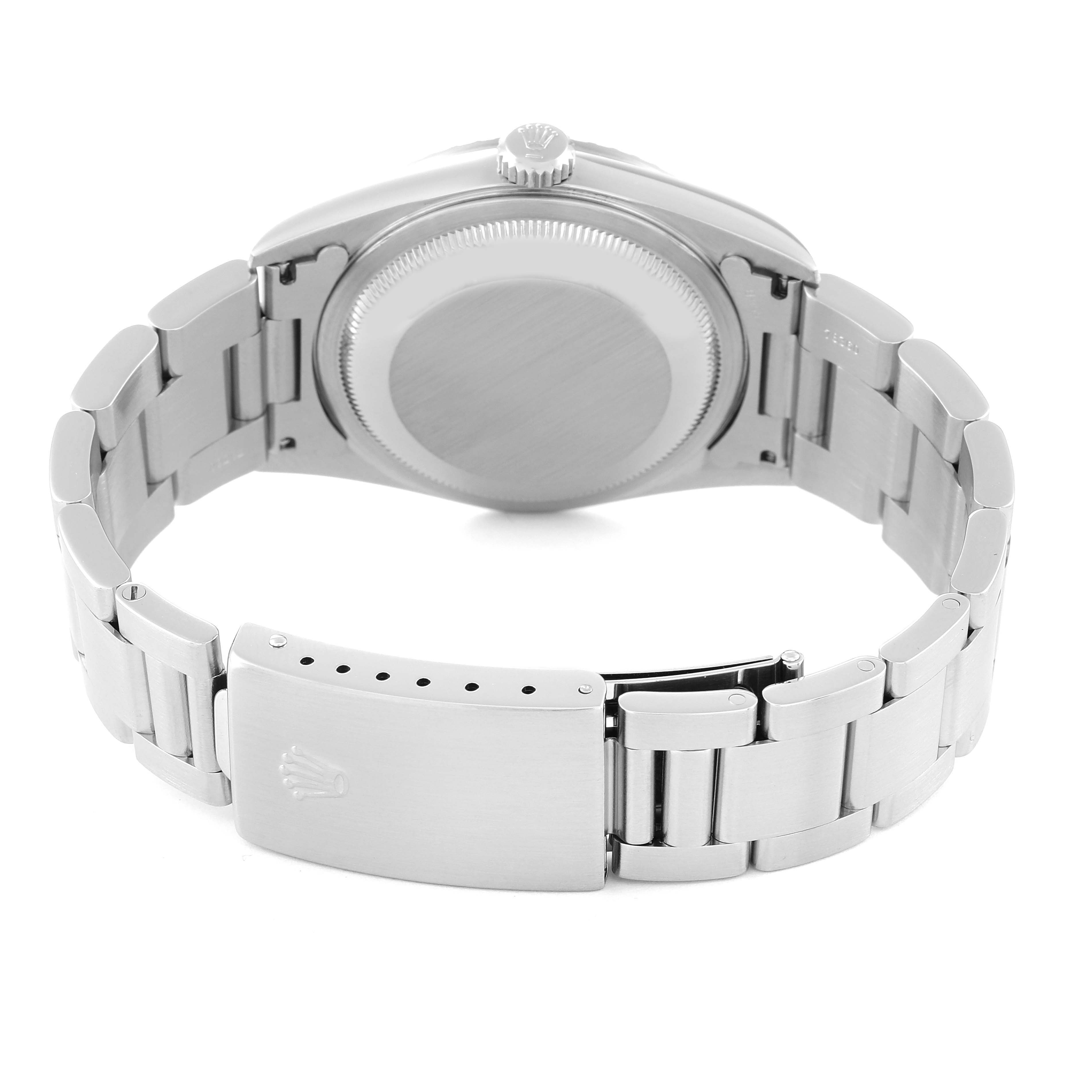 This image shows the back side of the Rolex Datejust 16220 Men's Stainless Steel White Dial 16220 Men's Stainless Steel White Dial watch, highlighting the clasp, bracelet, and case back.