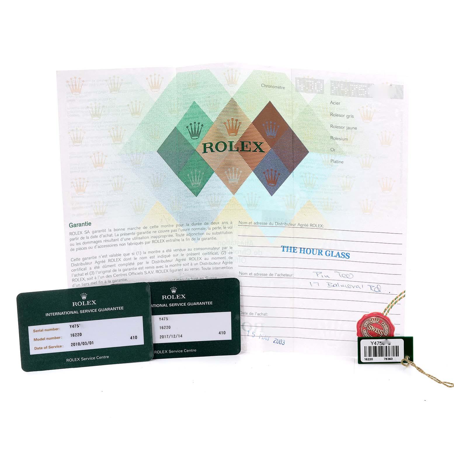 This image shows the guarantee card, service card, and tag accessories for a Rolex Datejust 16220 Men's Stainless Steel White Dial 16220 Men's Stainless Steel White Dial model.