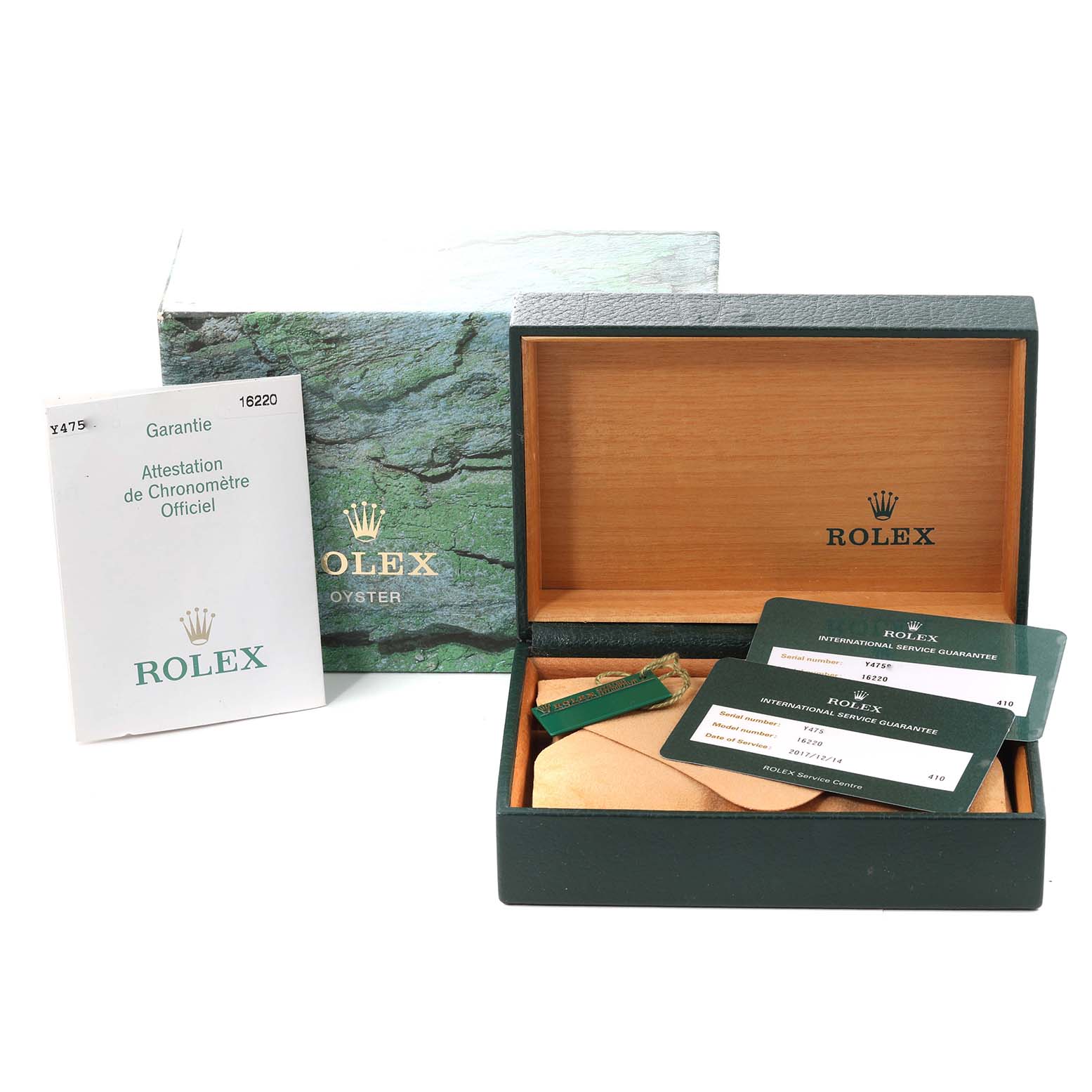 The image shows a Rolex Datejust 16220 Men's Stainless Steel White Dial 16220 Men's Stainless Steel White Dial watch’s box, certificate, and guarantee cards from a front angle.